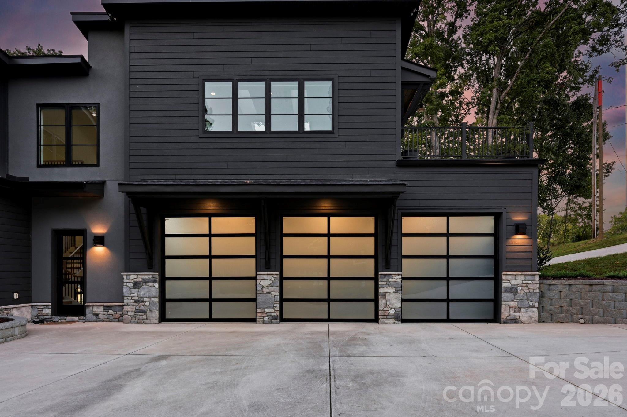 Section of front elevation, showing attractive garage doors - 298 Marietta Road, Mooresville
