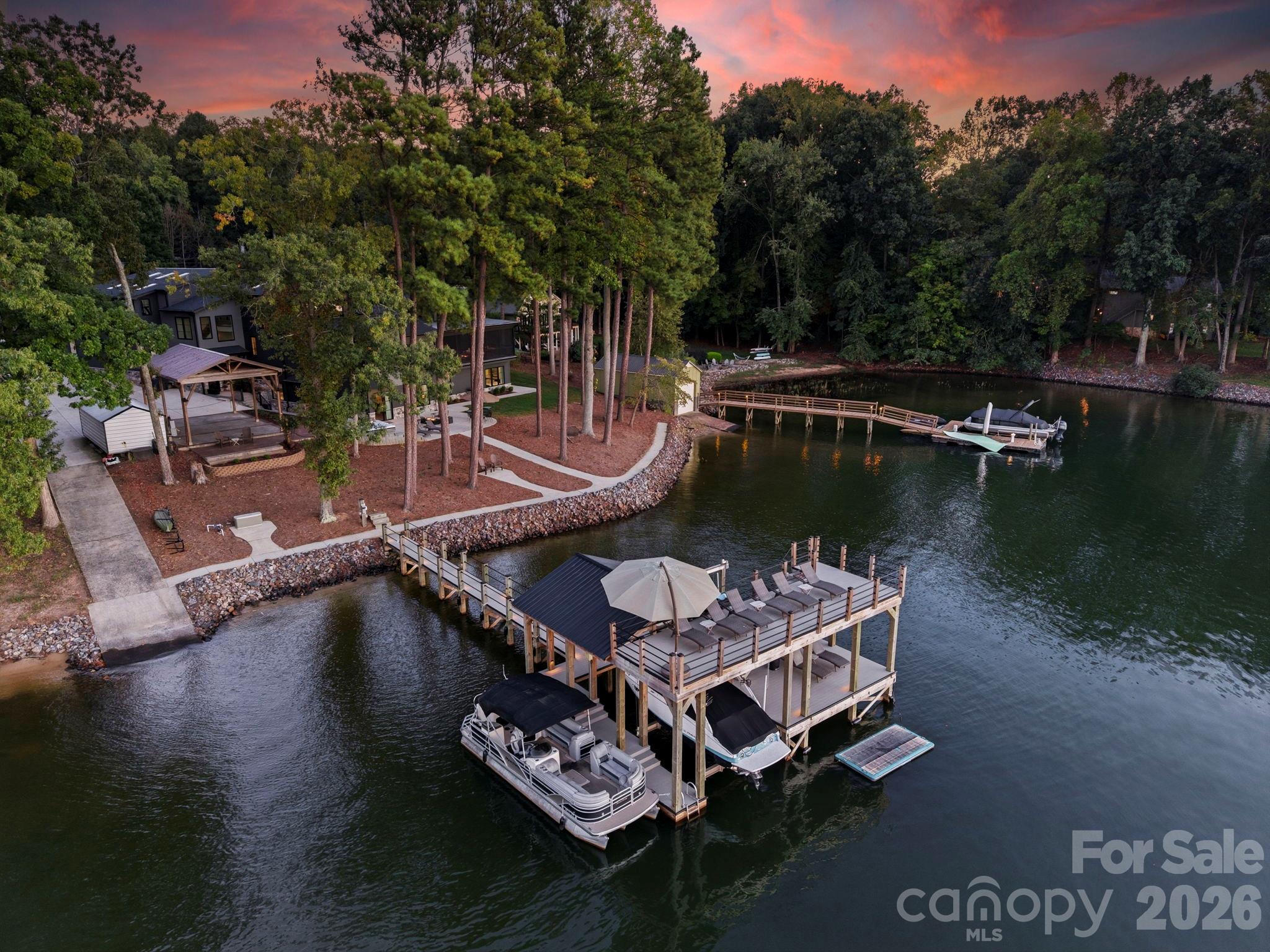 Extra large double decker dock, plus sidewalks grandfathered in along water's edge no longer able to be built - 298 Marietta Road, Mooresville