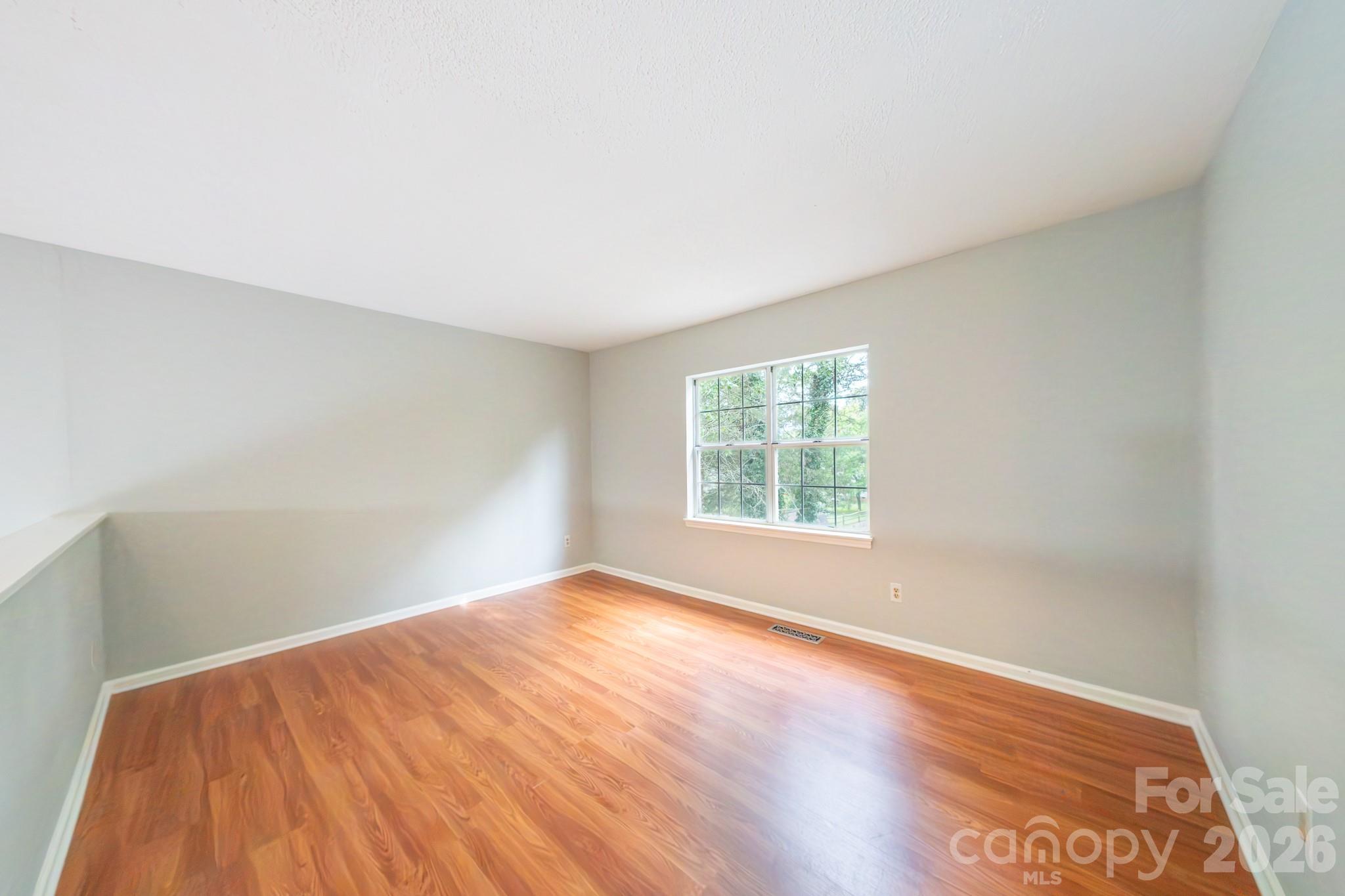 Open loft/bonus area upstairs that can be a home office or separate activity area - 13836 Poppleton Court, Charlotte