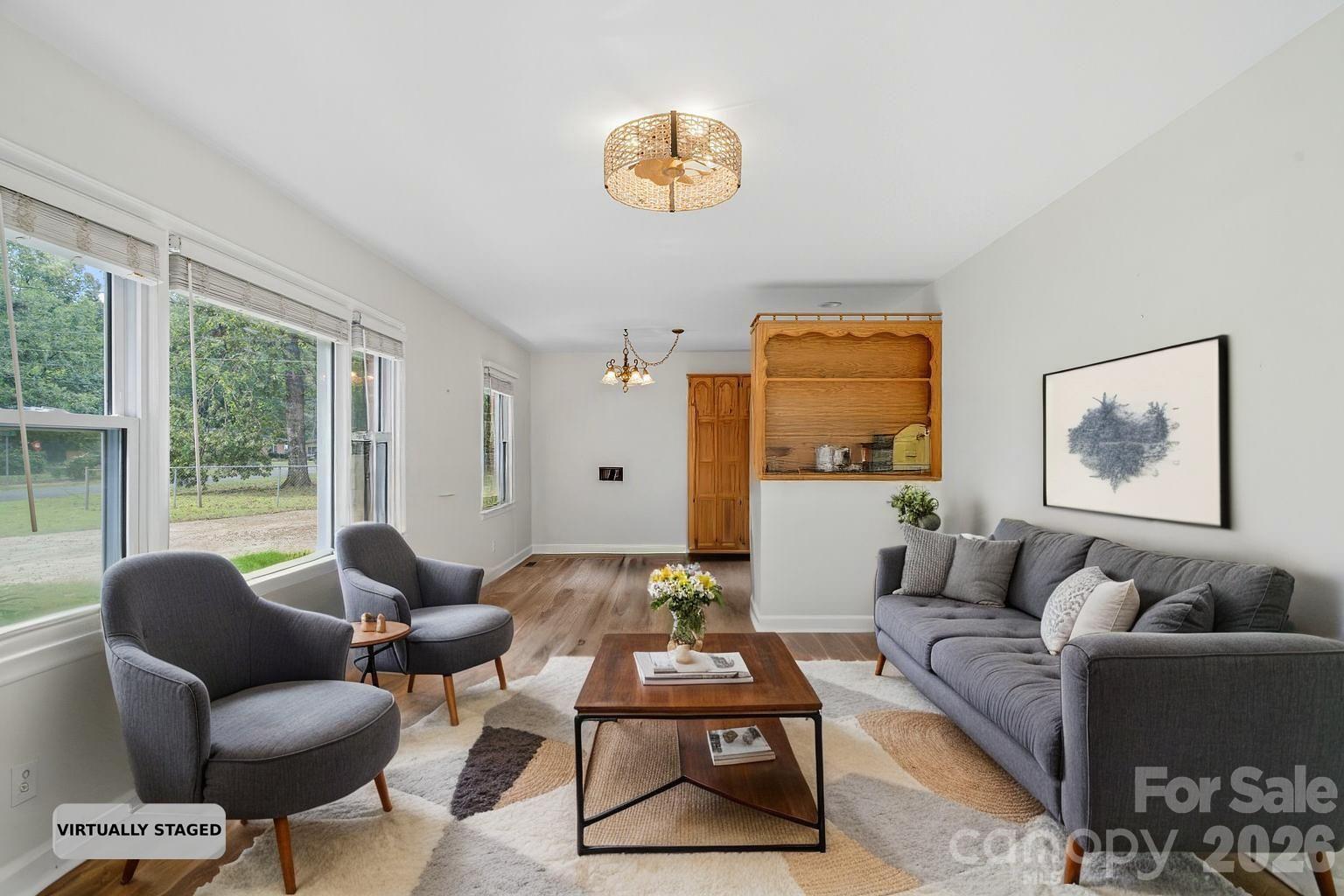 DINING AREA/LIVING ROOM (staged) - 2101 Shady Lane, Monroe
