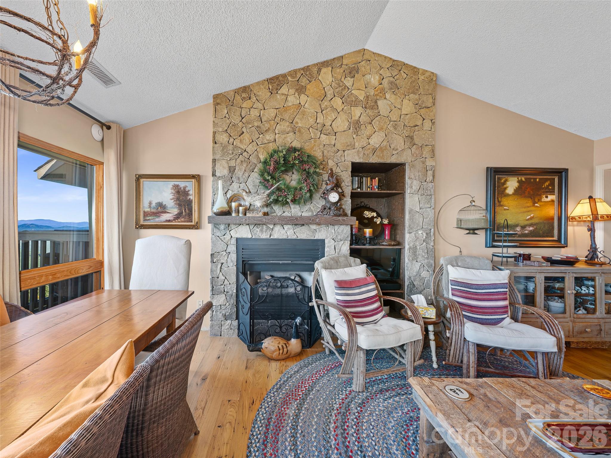 Floor to ceiling stone fireplace with gas-logs - 80 Slickrock Road, Burnsville