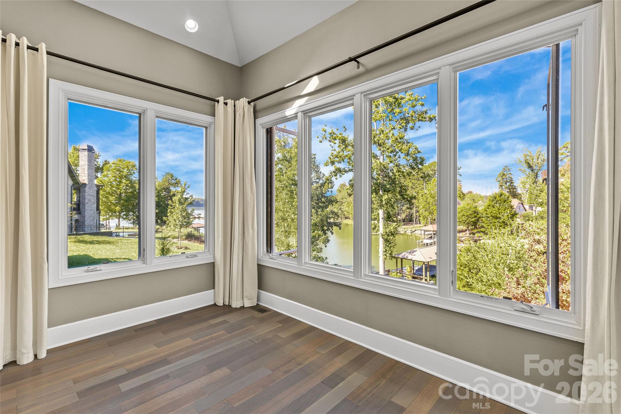 Primary suite with incredible lake views. - 6032 Headlands Court, Belmont