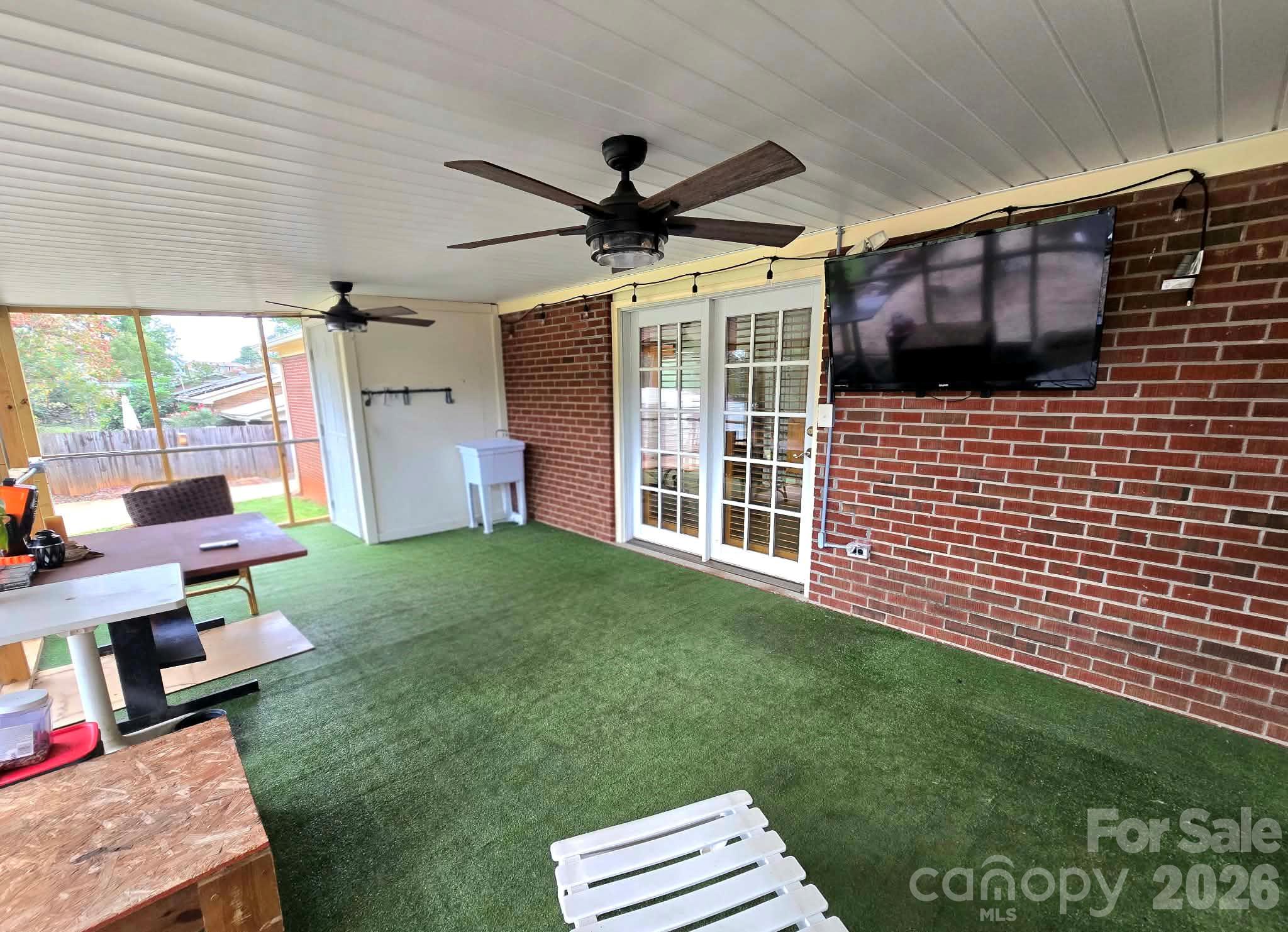 Screened in covered back Deck with direct entrance into the kitchen - 4107 Windwood Drive, Gastonia