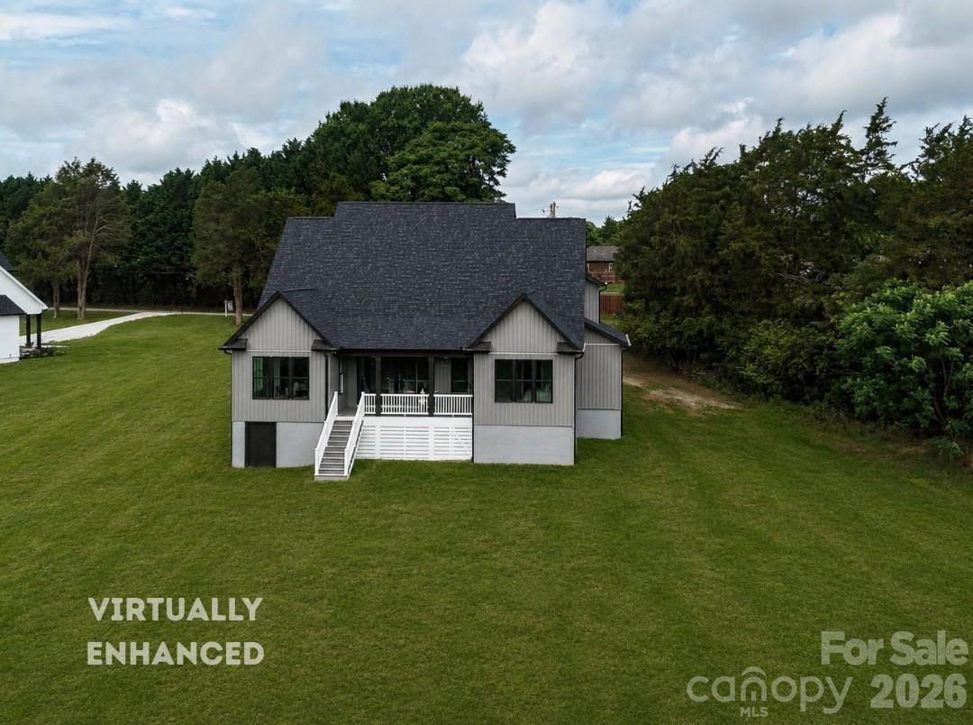 Concept Grass - Enjoy peaceful backyard living with a spacious space covered porch, expansive green space & private tree-lined views perfect for relaxing or entertaining. - 159 Lone Pine Road, Statesville