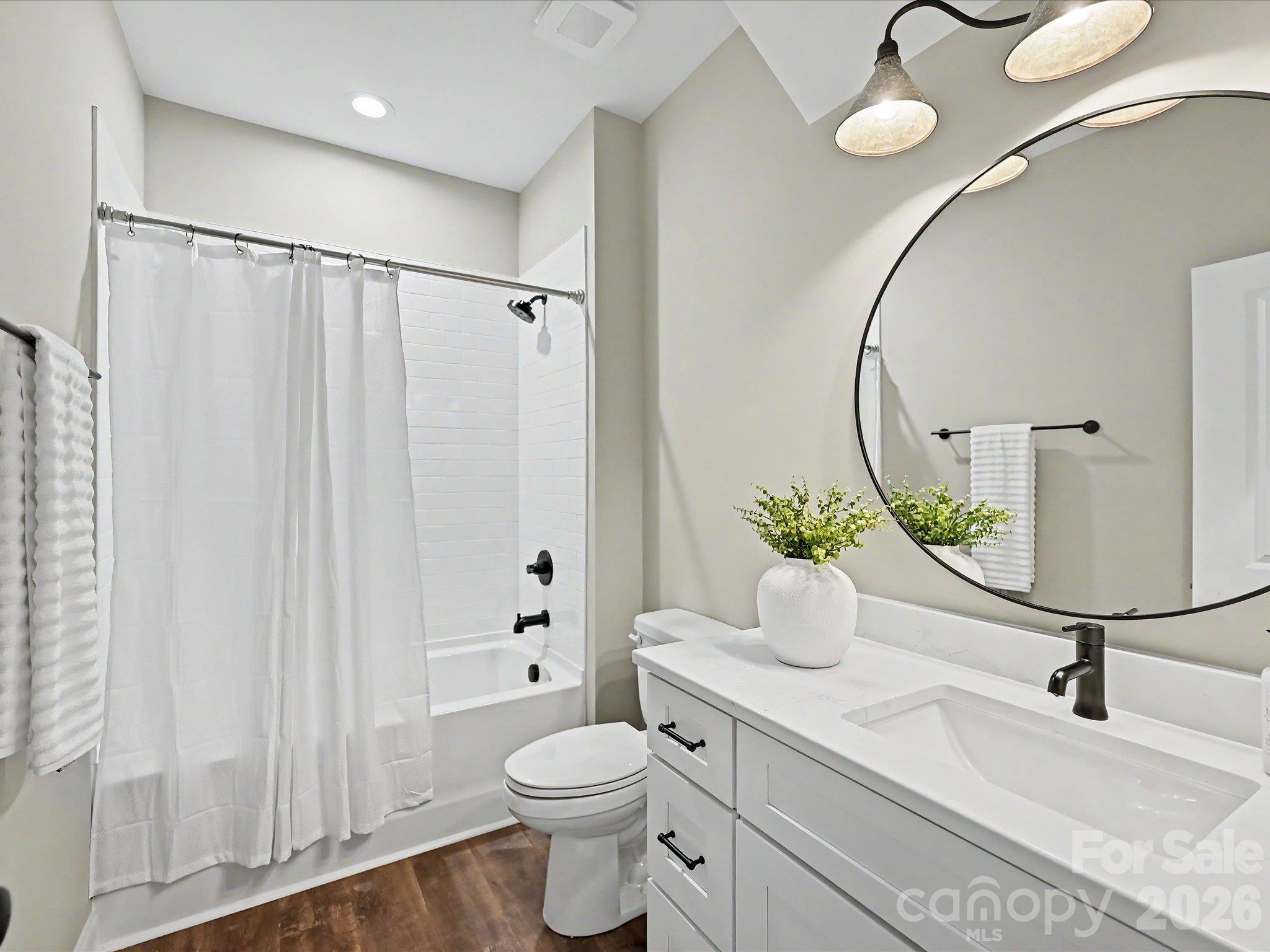 Stylish full bath features modern finishes, sleek fixtures & a clean, contemporary design perfect for guests. - 159 Lone Pine Road, Statesville