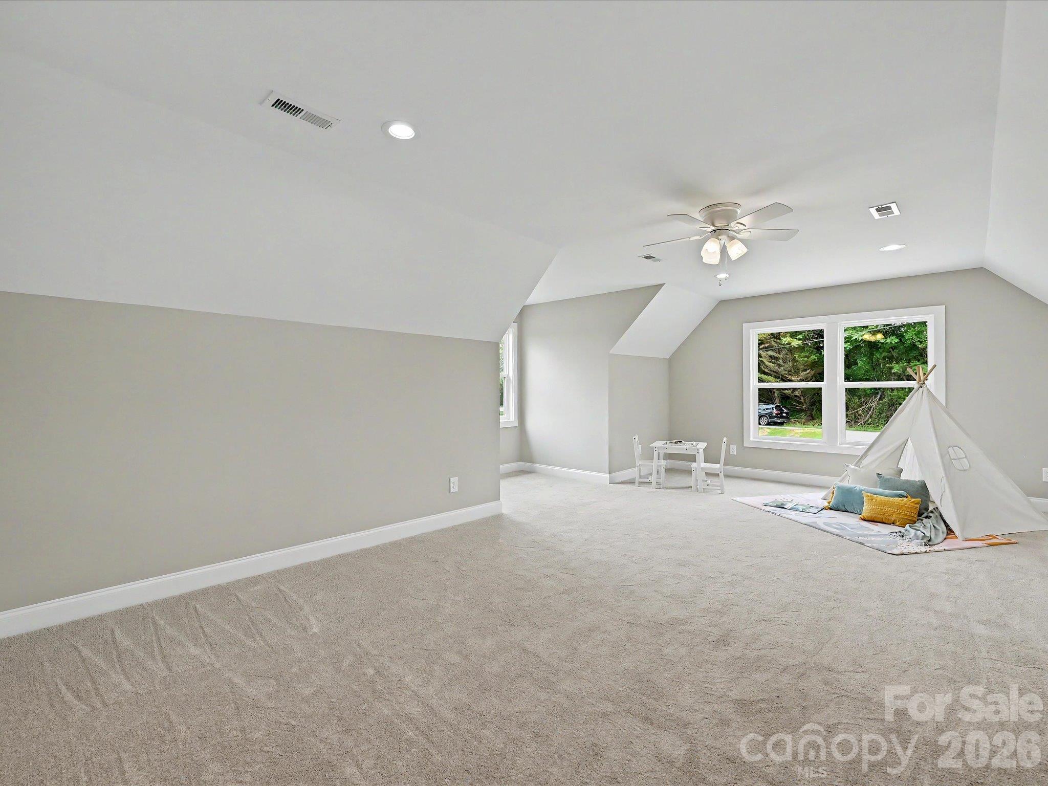 Spacious bonus room offers endless flexibility for a media room, playroom, home gym or additional living space. - 159 Lone Pine Road, Statesville
