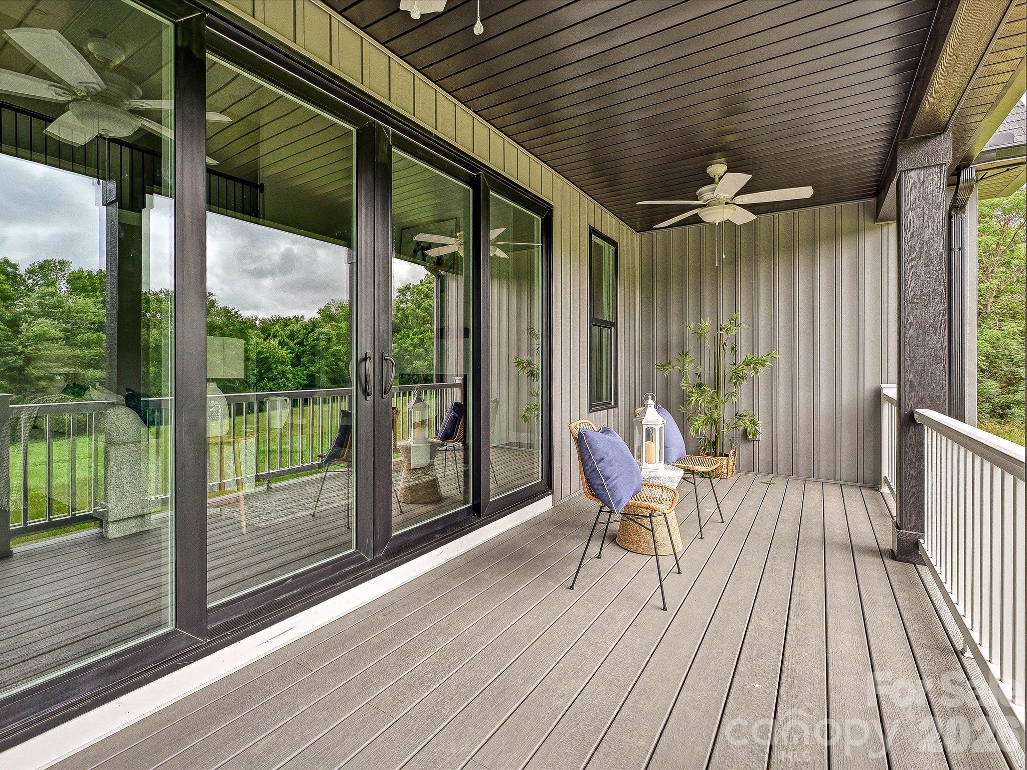 Relax & unwind on the covered back porch overlooking peaceful green space & scenic tree lined views. - 159 Lone Pine Road, Statesville