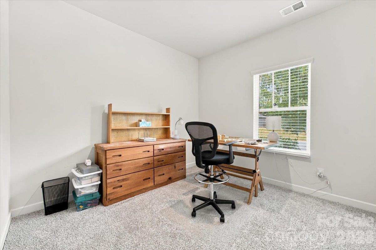 Secondary bedroom off the front foyer. - 7722 Porrera Street, Charlotte