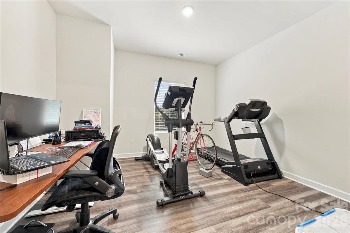 Flex space with LVP flooring. - 7722 Porrera Street, Charlotte