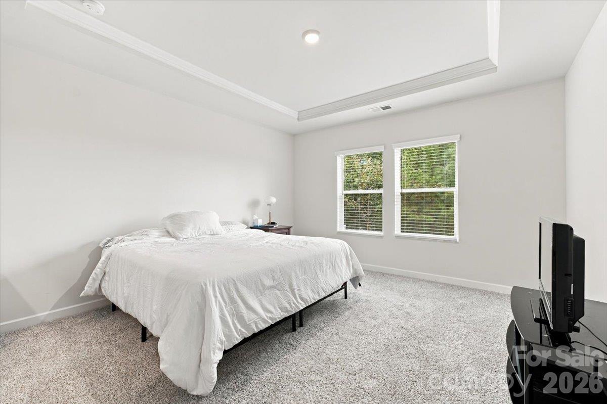 Primary bedroom with space to spread out. - 7722 Porrera Street, Charlotte