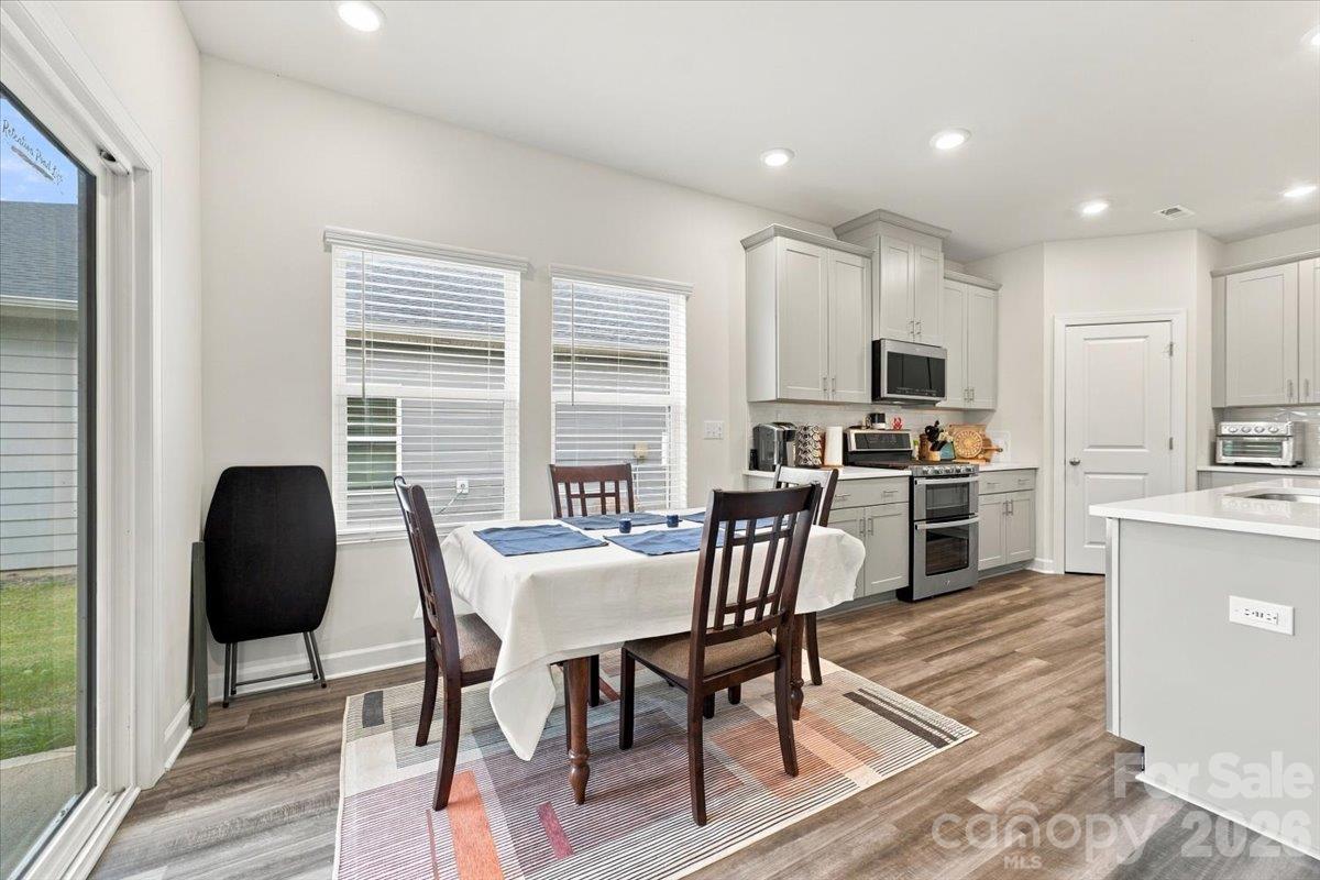 Tons of natural light in this open entertaining area. - 7722 Porrera Street, Charlotte