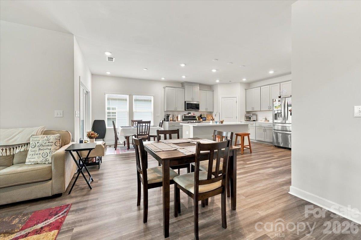 View from the living room to the kitchen areas. - 7722 Porrera Street, Charlotte