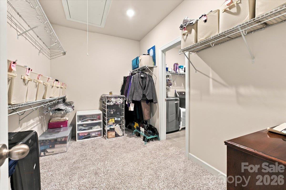 Primary closet. - 7722 Porrera Street, Charlotte
