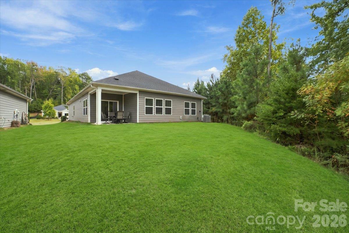 Rear view of the home. - 7722 Porrera Street, Charlotte