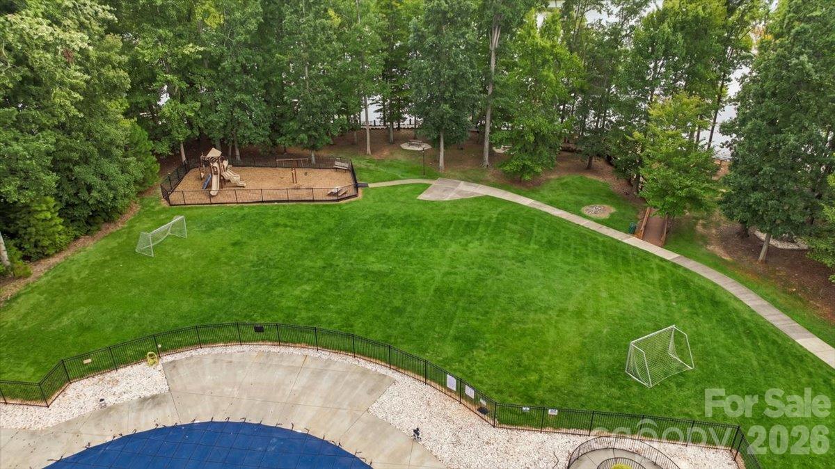 Playground located lake front. - 7722 Porrera Street, Charlotte