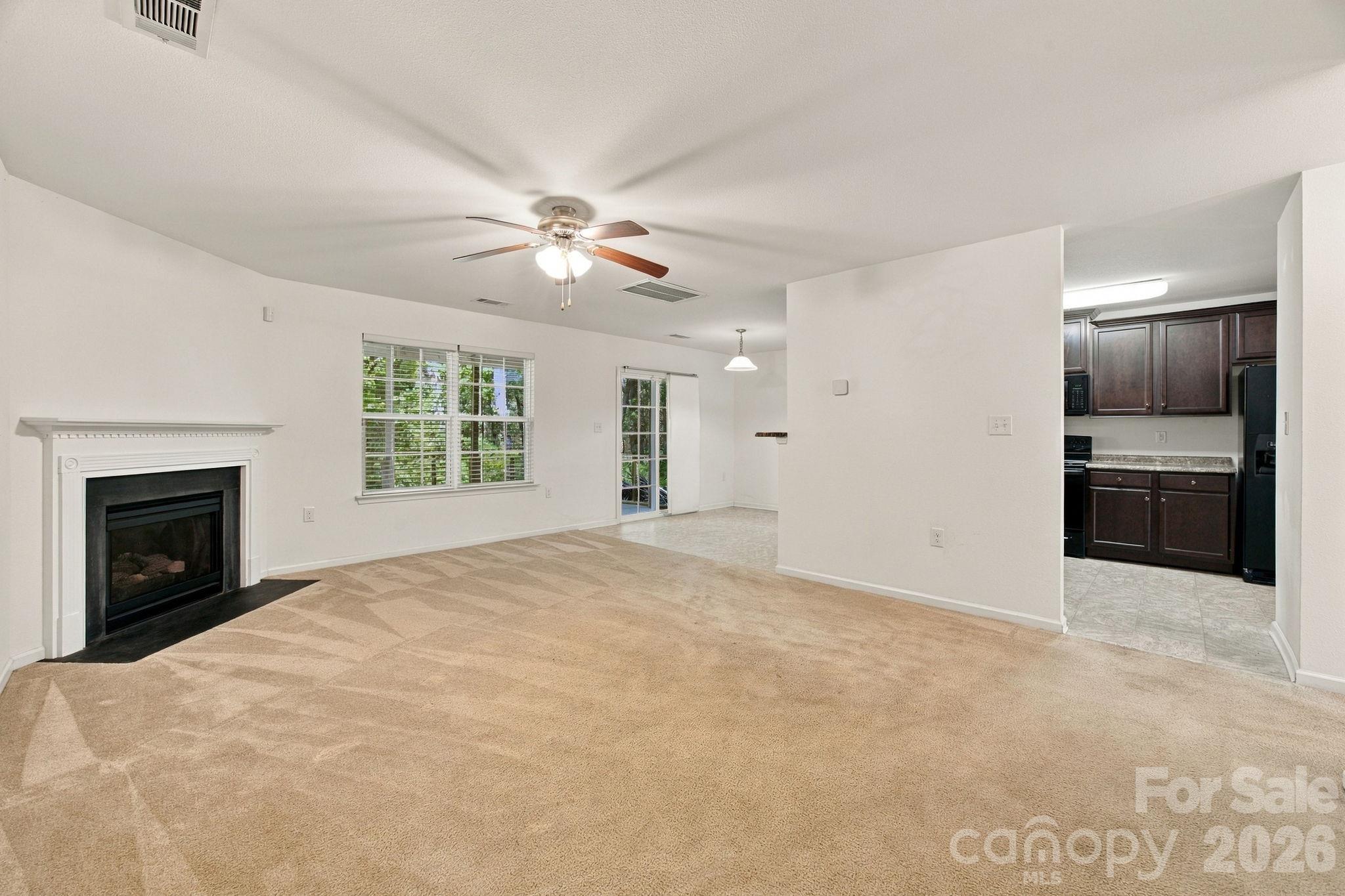 Family Room with gas fireplace - 11604 Ragan Elizabeth Court, Charlotte