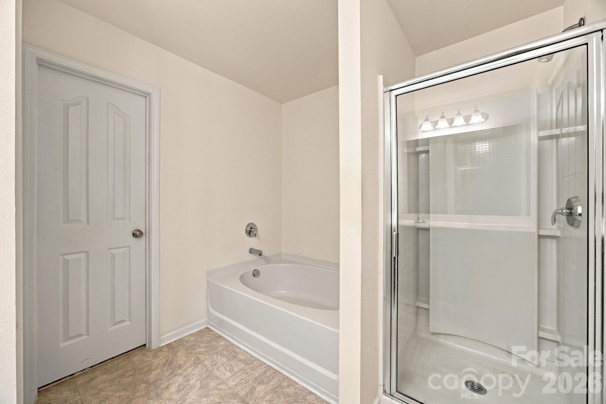 Primary Bath with separate tub and shower - 11604 Ragan Elizabeth Court, Charlotte