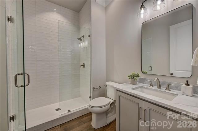 Full BathCourtesy of Simonini Homes - 6510 Sharon Hills Road, Charlotte