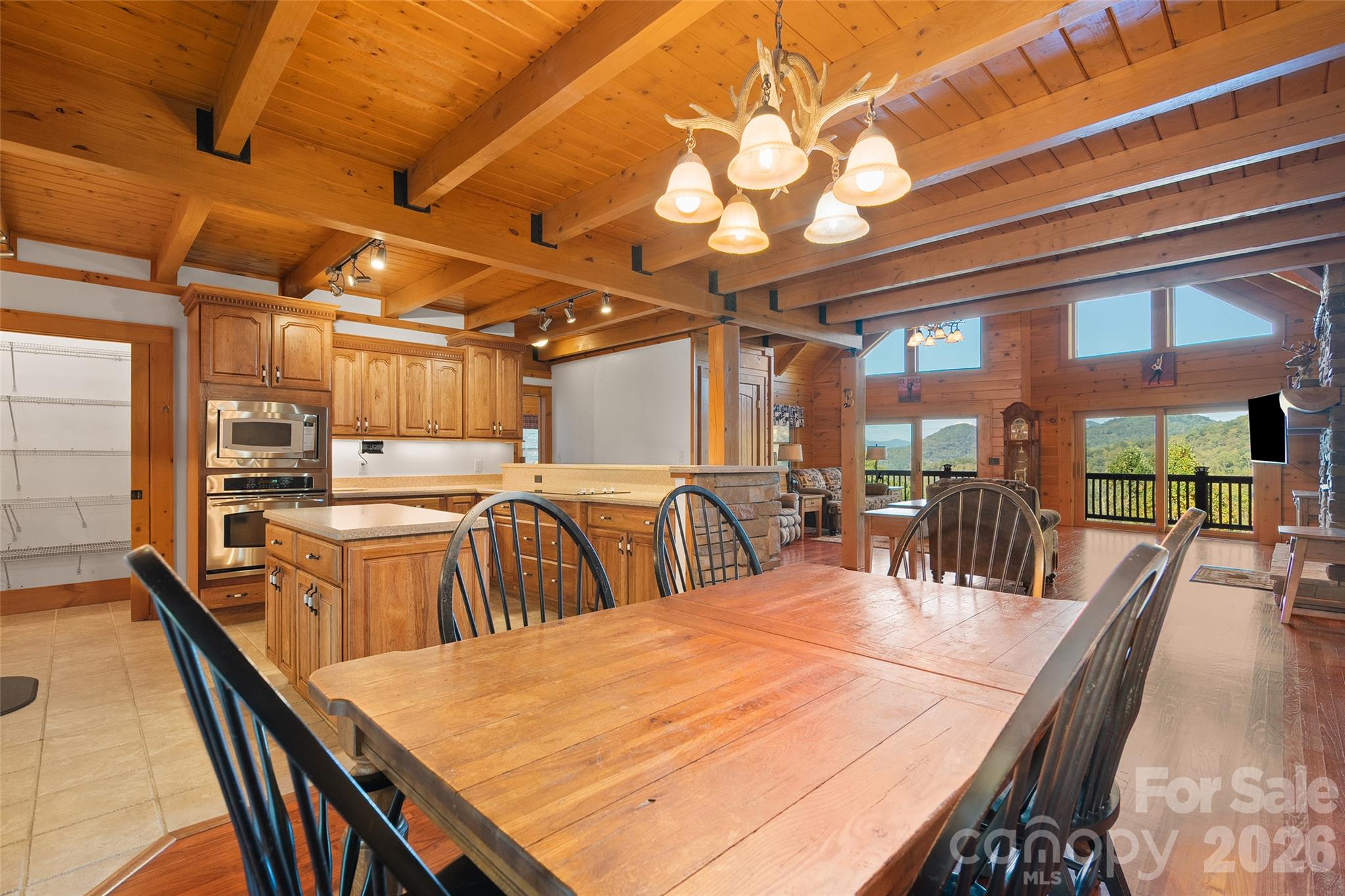 Spacious dining area, perfect for gathering family and friends. - 124 Borges Lane, Waynesville