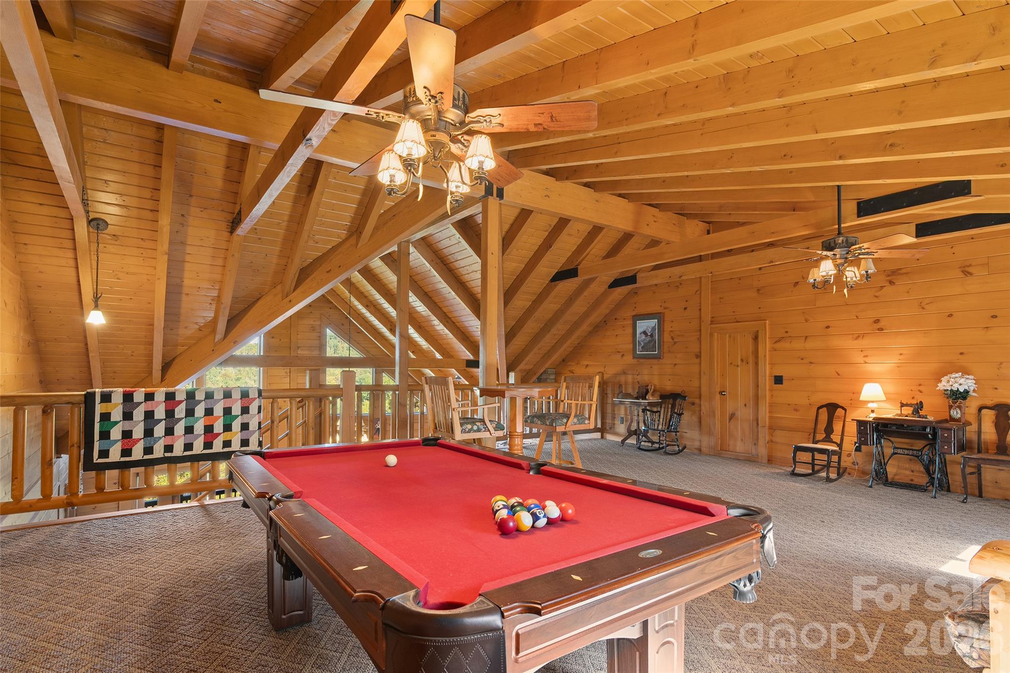 Expansive upper-level loft with pool table and room for recreation. - 124 Borges Lane, Waynesville