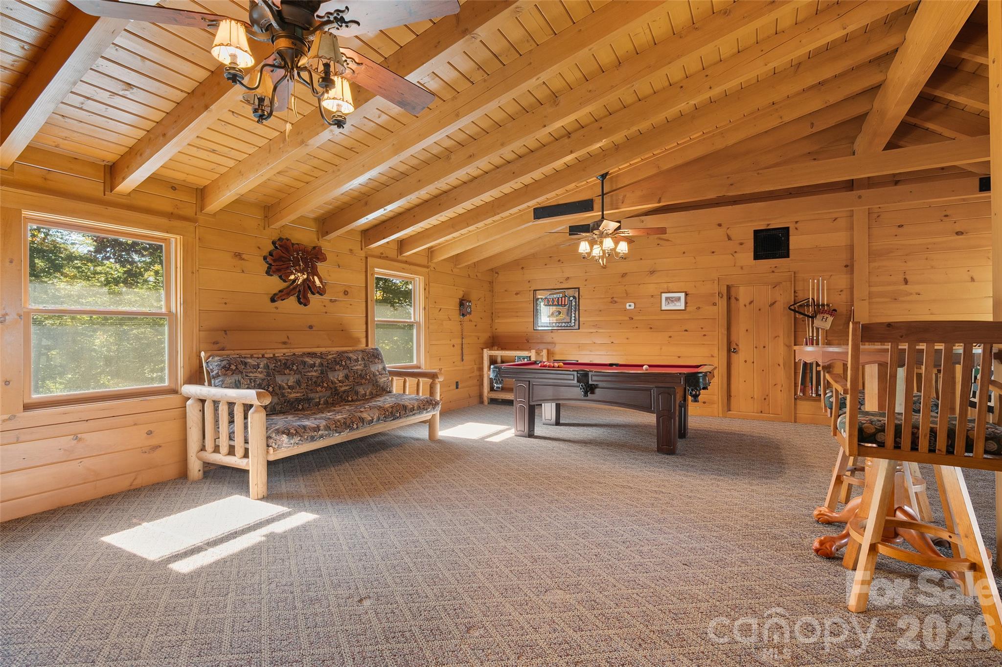 Versatile 624-square-foot loft overlooks the impressive great room. - 124 Borges Lane, Waynesville