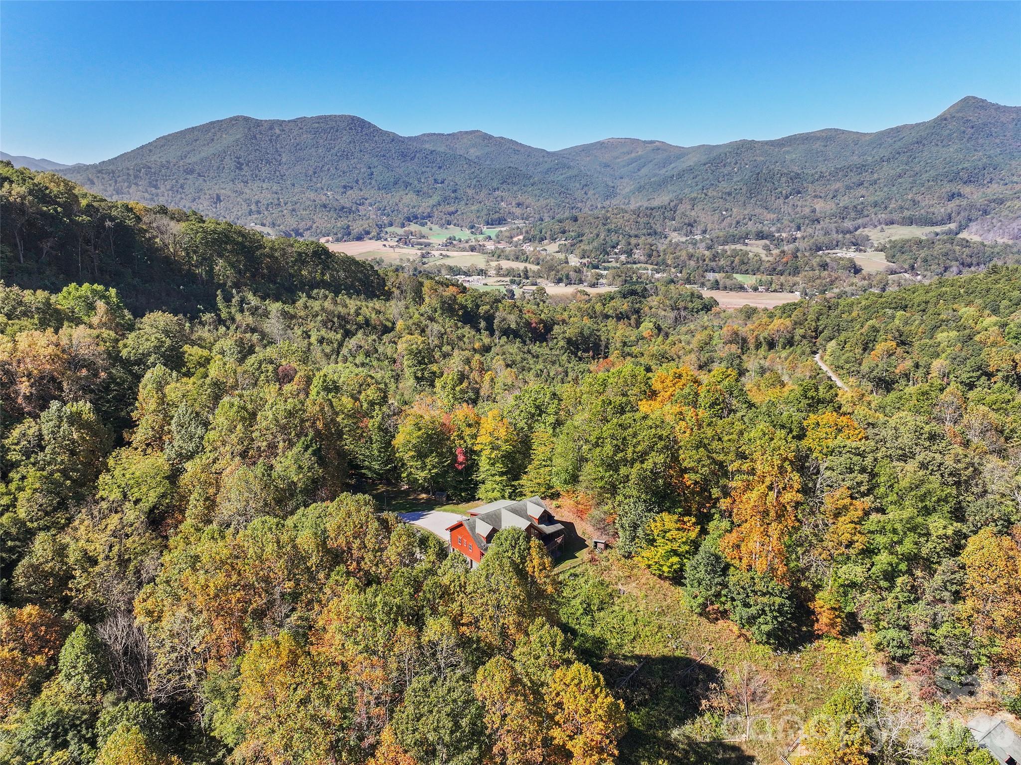 Elevated aerial view highlights the scenic mountain surroundings. - 124 Borges Lane, Waynesville