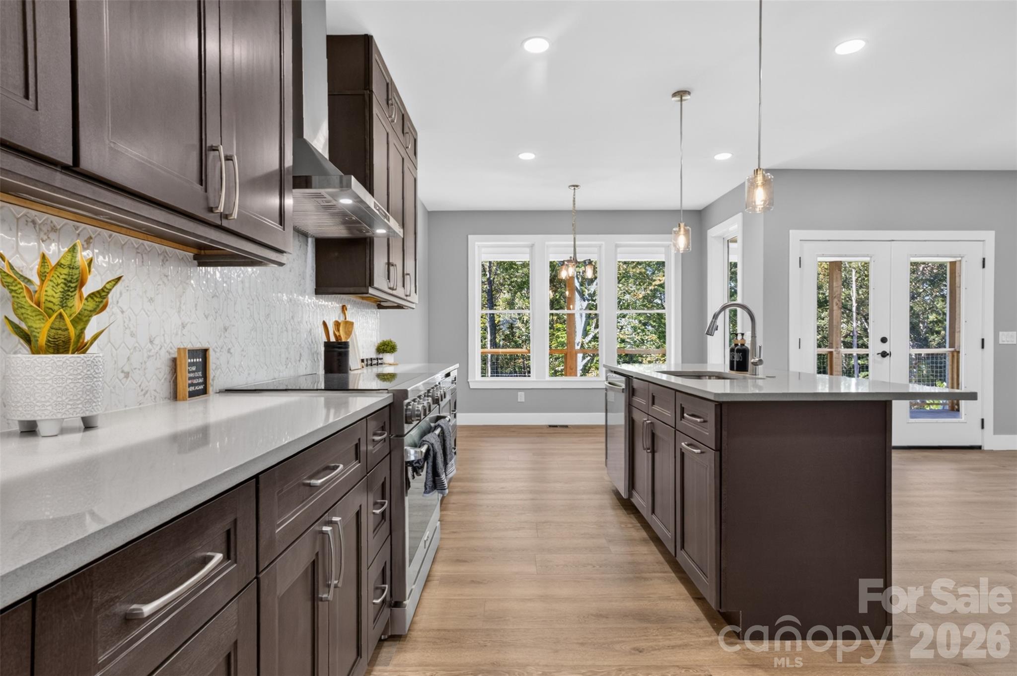 The large island has seating for plenty of your guests. - 160 Pumice Drive, Statesville