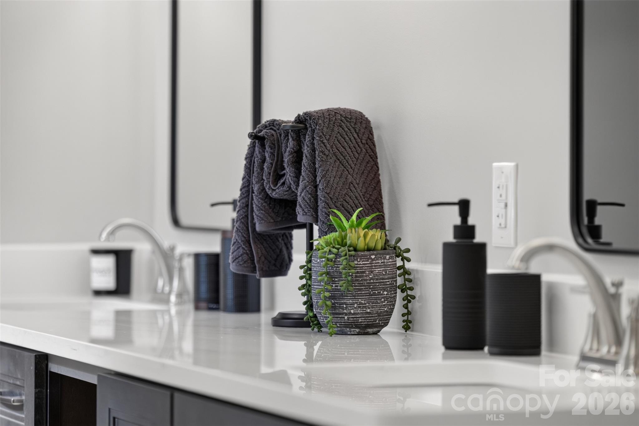 Dual sink vanity in the primary bathroom. - 160 Pumice Drive, Statesville
