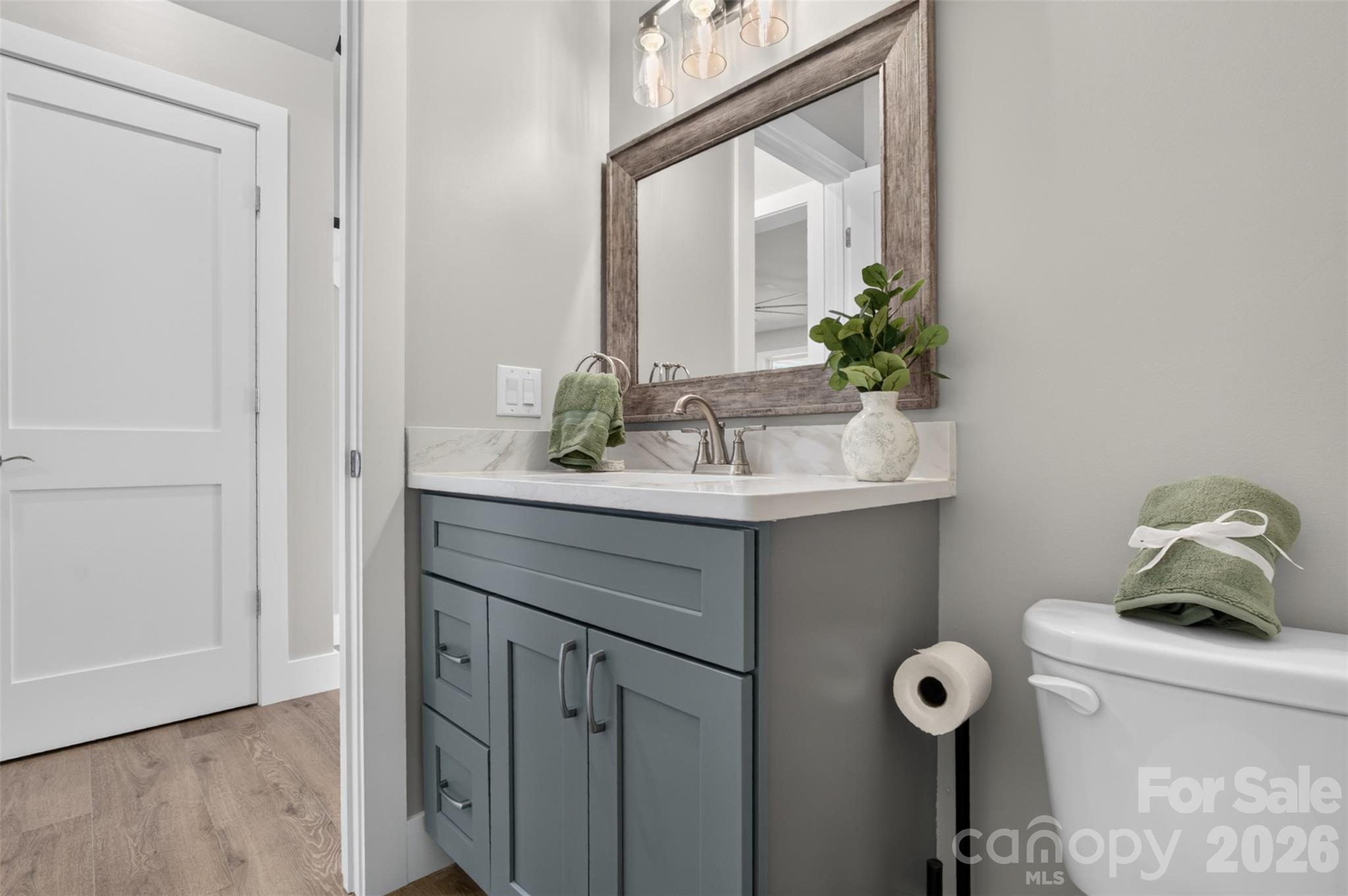 The powder room off the main foyer. - 160 Pumice Drive, Statesville