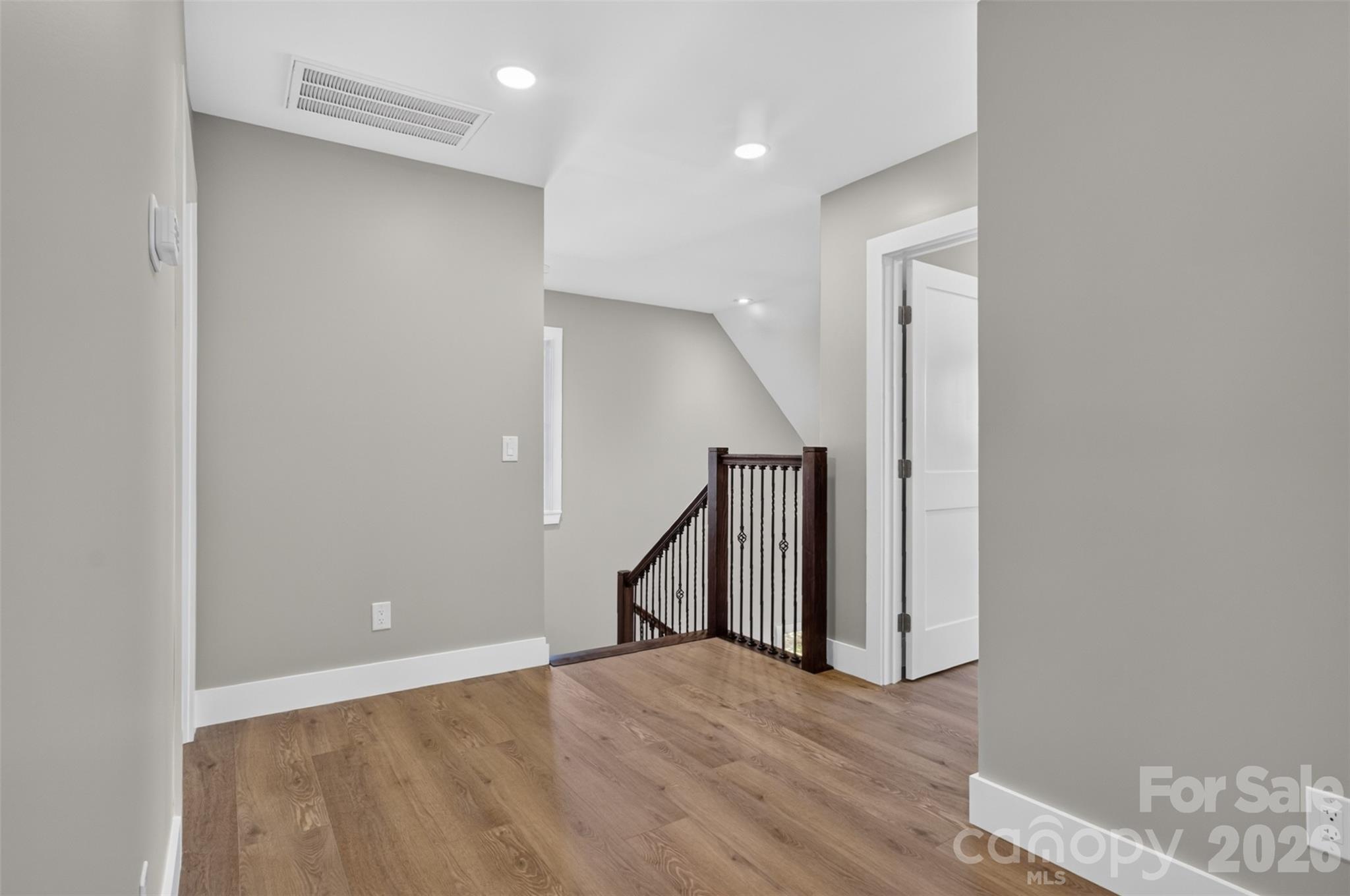 Open hallway to the secondary bedrooms. - 160 Pumice Drive, Statesville