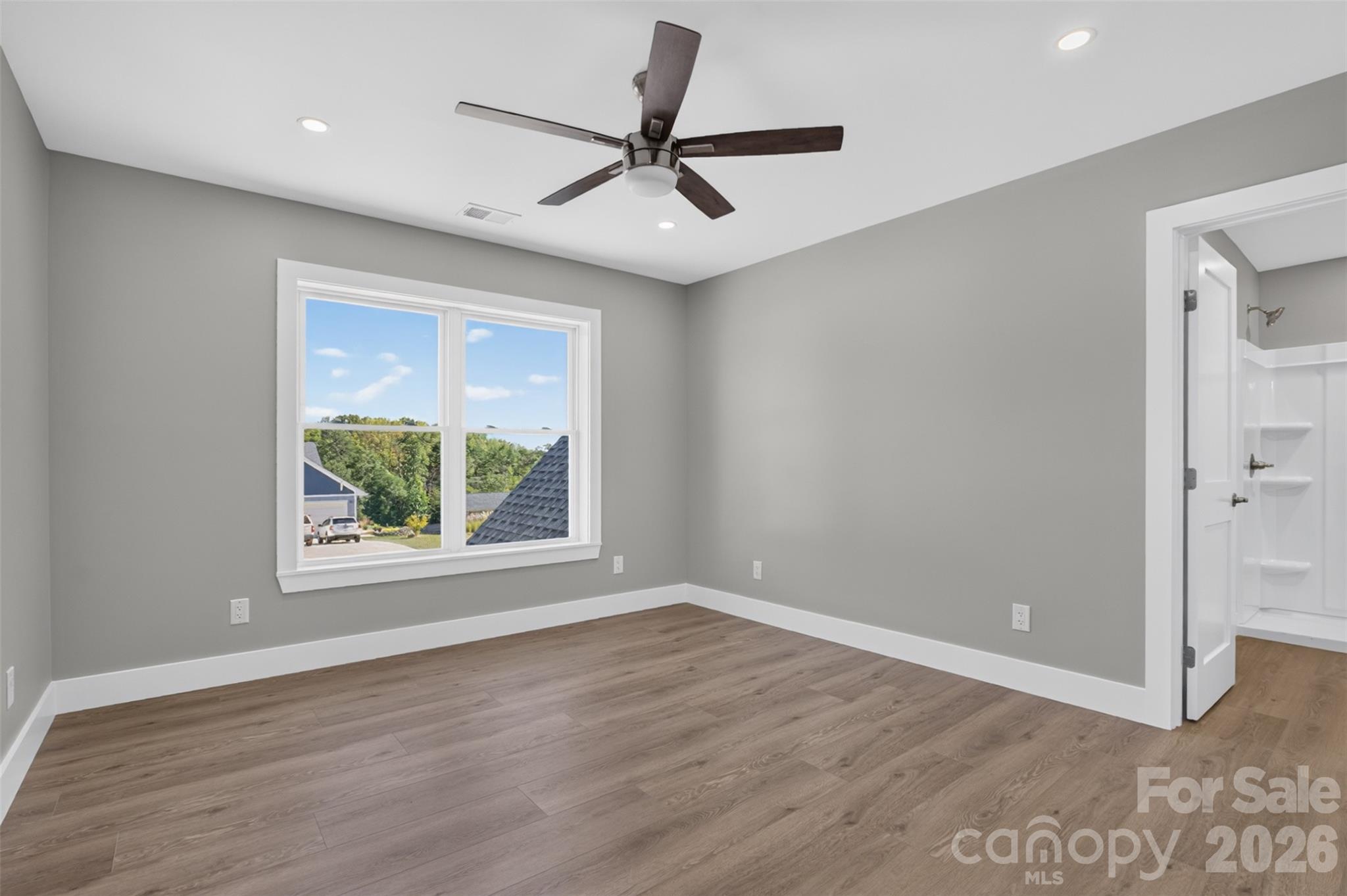 Bedroom #2 with a private ensuite bathroom. - 160 Pumice Drive, Statesville