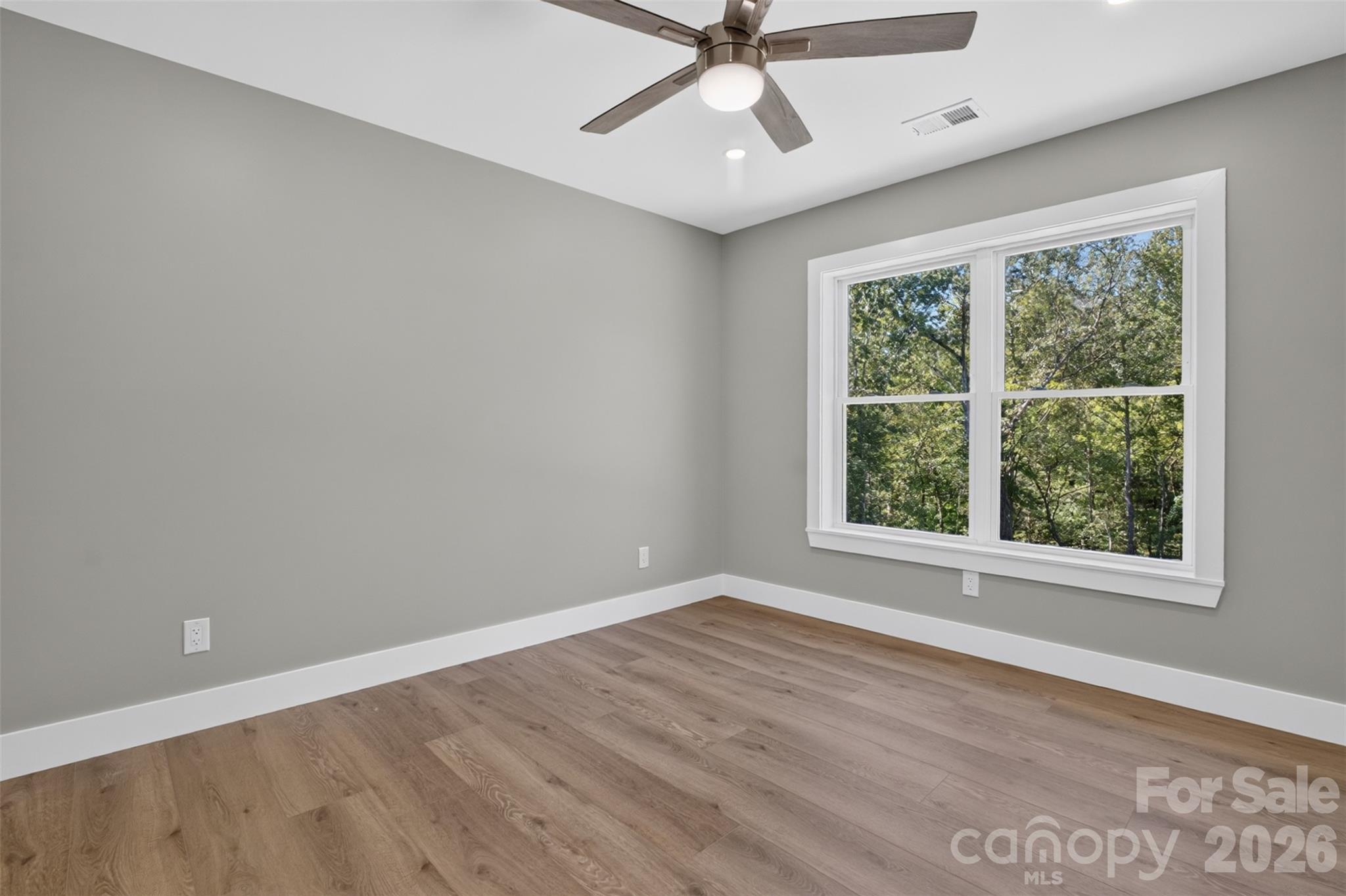 Bedroom #4 also looks out onto the backyard. - 160 Pumice Drive, Statesville