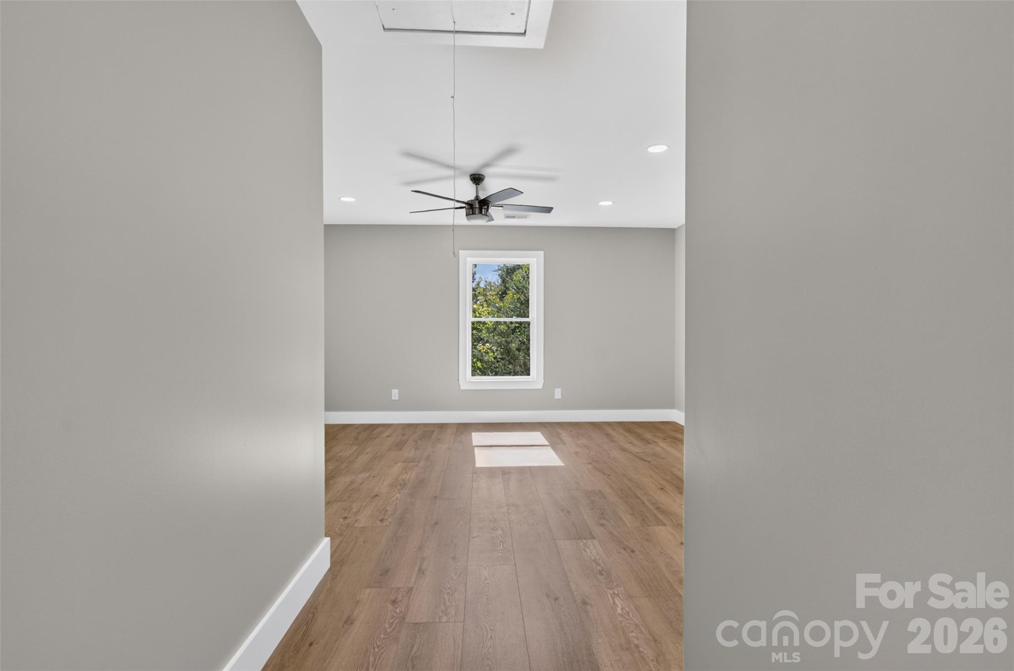 Down the hallway to the game room/flex room. - 160 Pumice Drive, Statesville