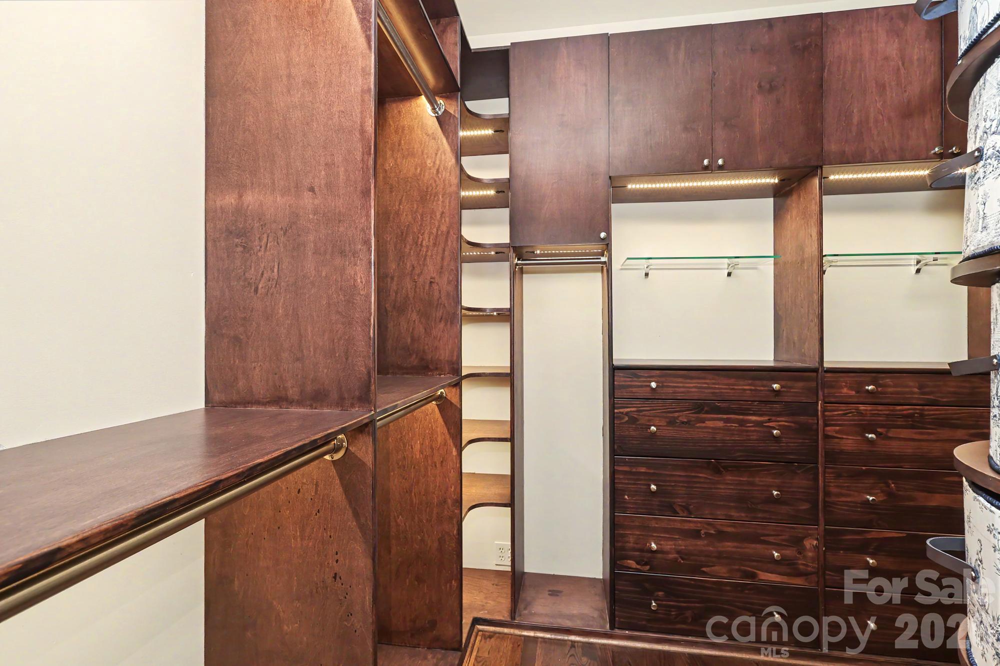 Primary Closet with custom built ins - 4320 Town And Country Drive, Charlotte