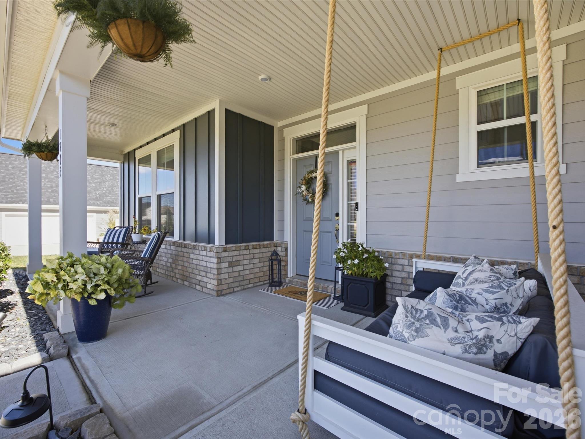 Large covered front porch with lots of seating - 1305 Coppergate Drive, Salisbury