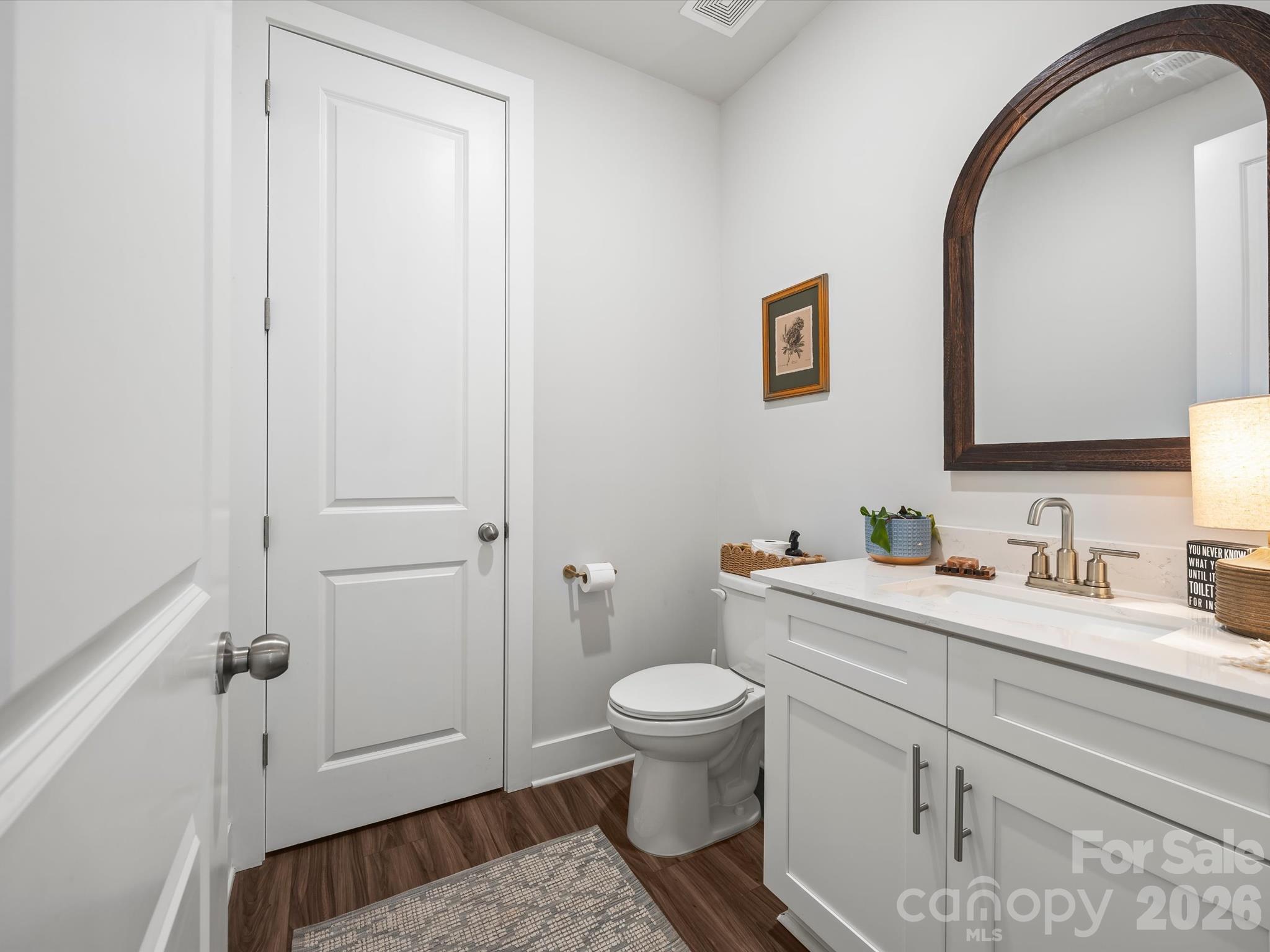 Main level half bath with large storage closet - 1305 Coppergate Drive, Salisbury