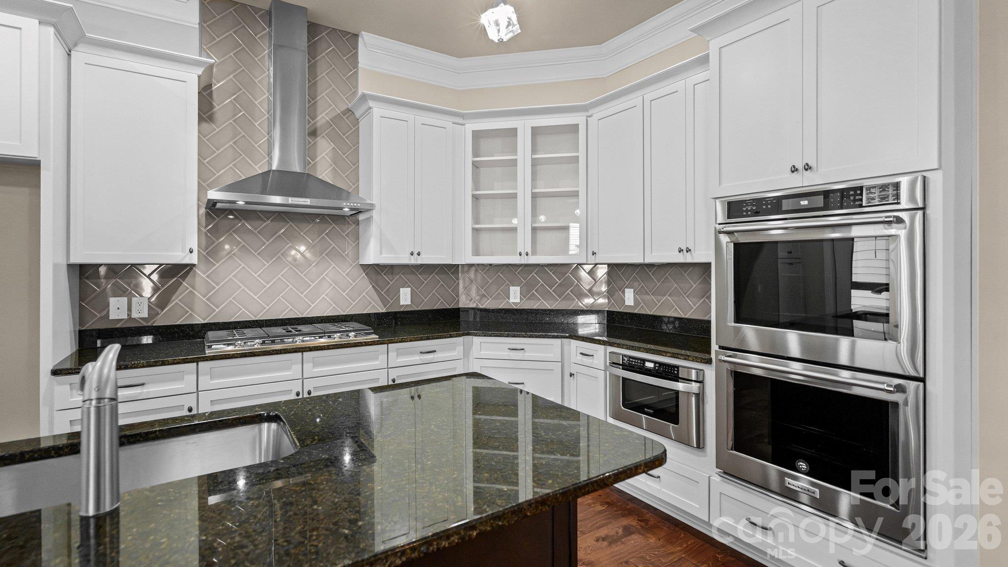 Stainless double wall ovens and vented range hood - 2050 Laney Pond Road, Matthews