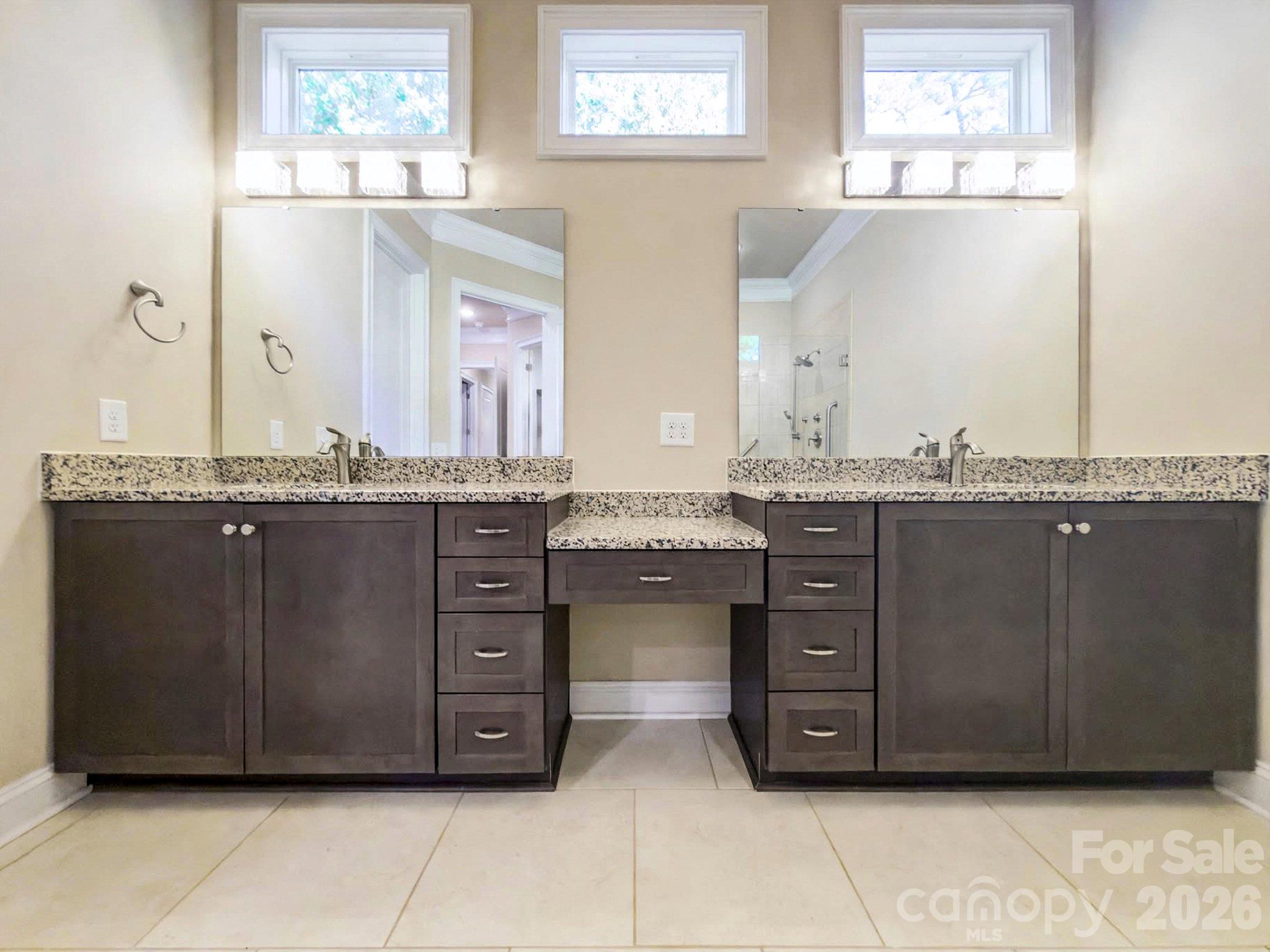 Primary bath with dual vanities and makeup counter - 2050 Laney Pond Road, Matthews
