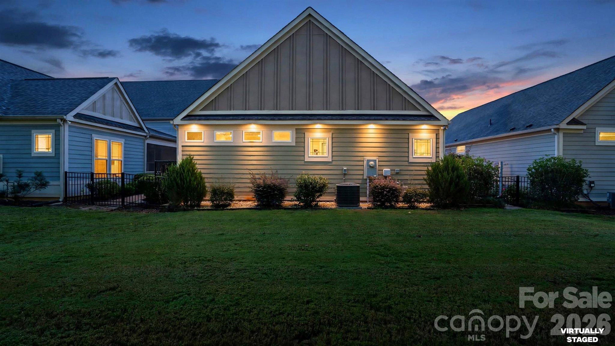 Rear exterior at twilight - 2050 Laney Pond Road, Matthews
