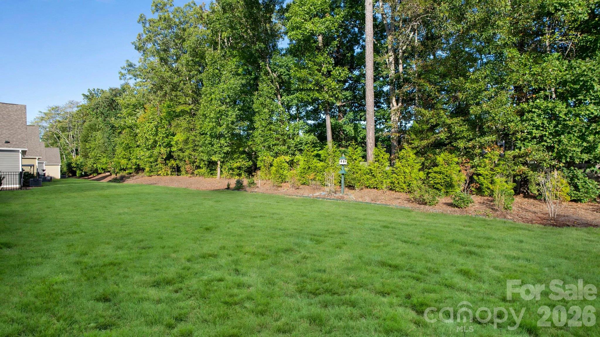 Large, private backyard bordered by mature trees - 2050 Laney Pond Road, Matthews