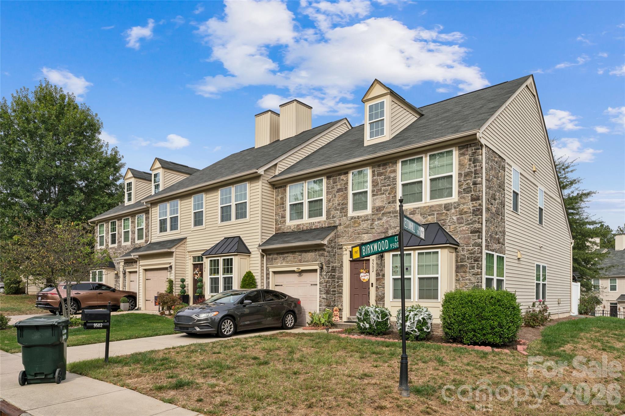 View from corner. Subject property is next to end unit. - 9506 Birkwood Court, Charlotte