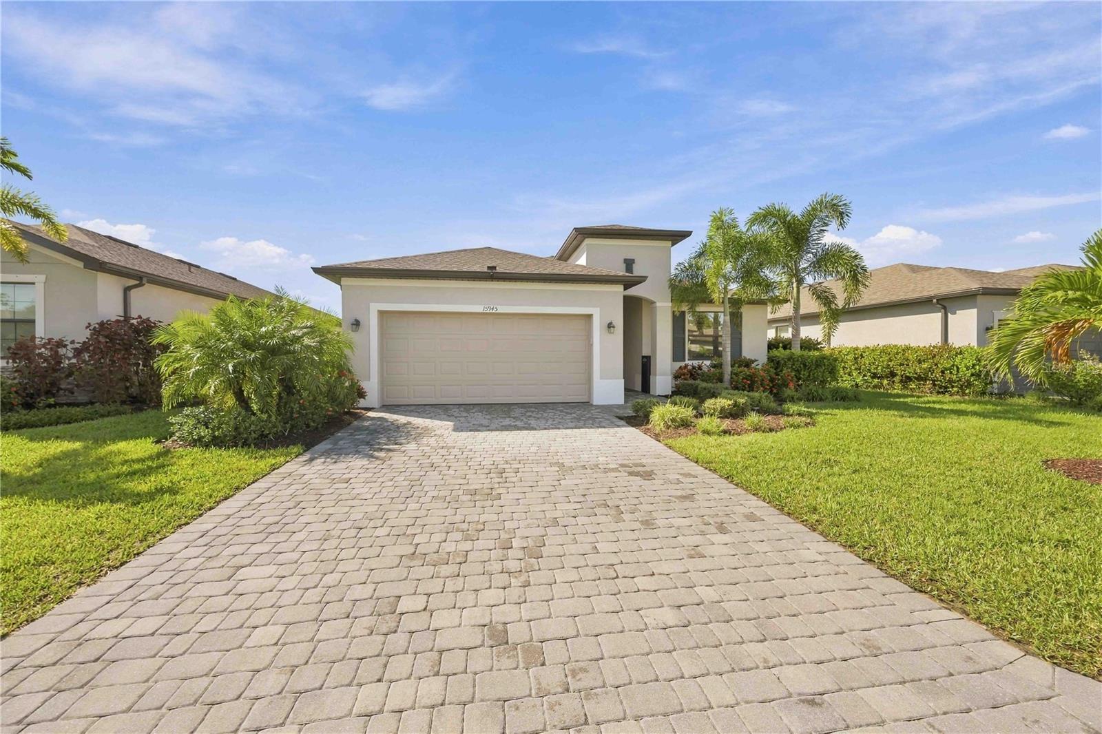 Pavered driveway and lanai - 15945 HONEY SUCKLE ST, PORT CHARLOTTE