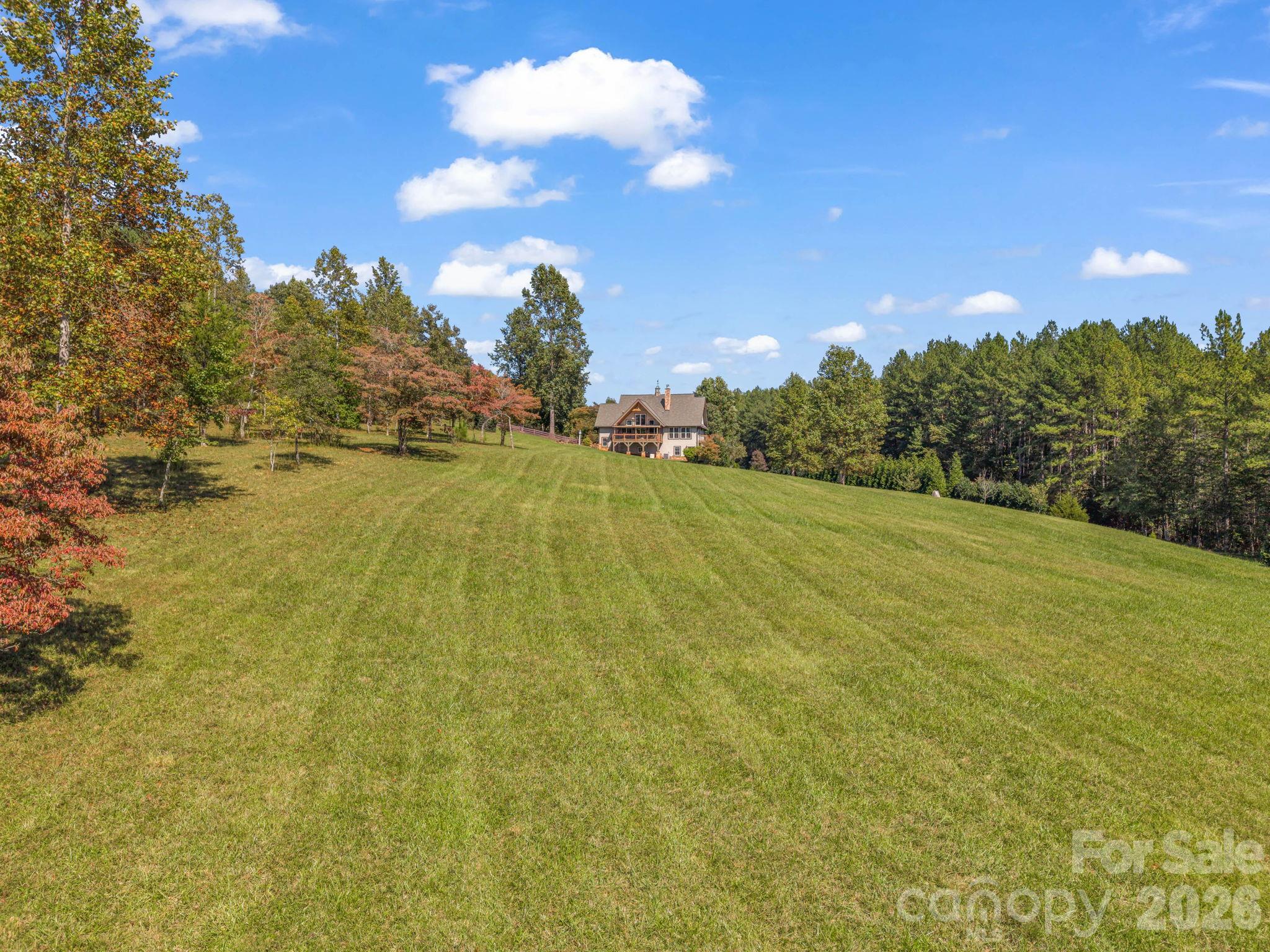 8+ cleared pasture acres, fencing added - 140 Blazing Star Lane, Mill Spring