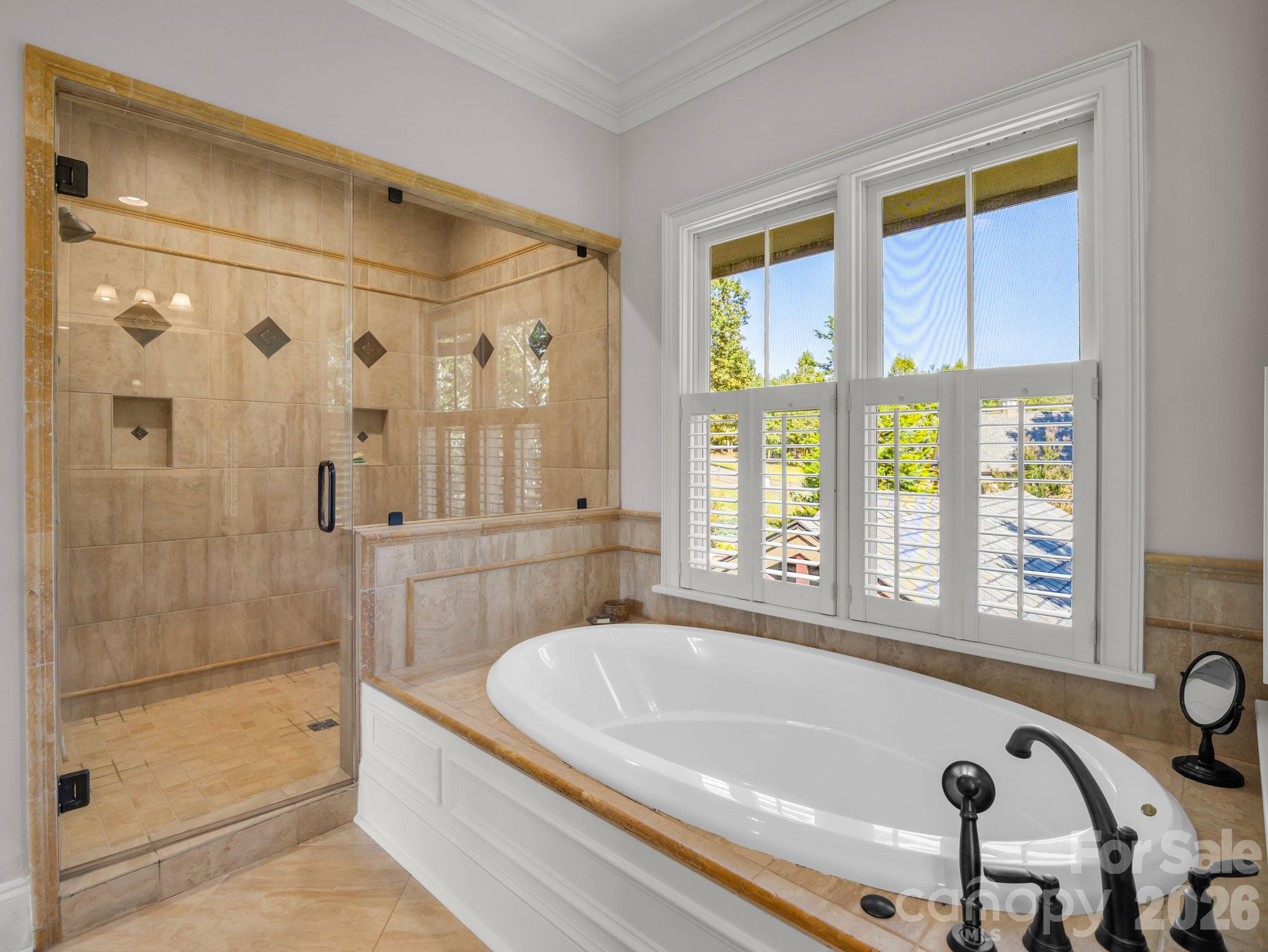 Primary bath on main level offers a steam shower - 140 Blazing Star Lane, Mill Spring