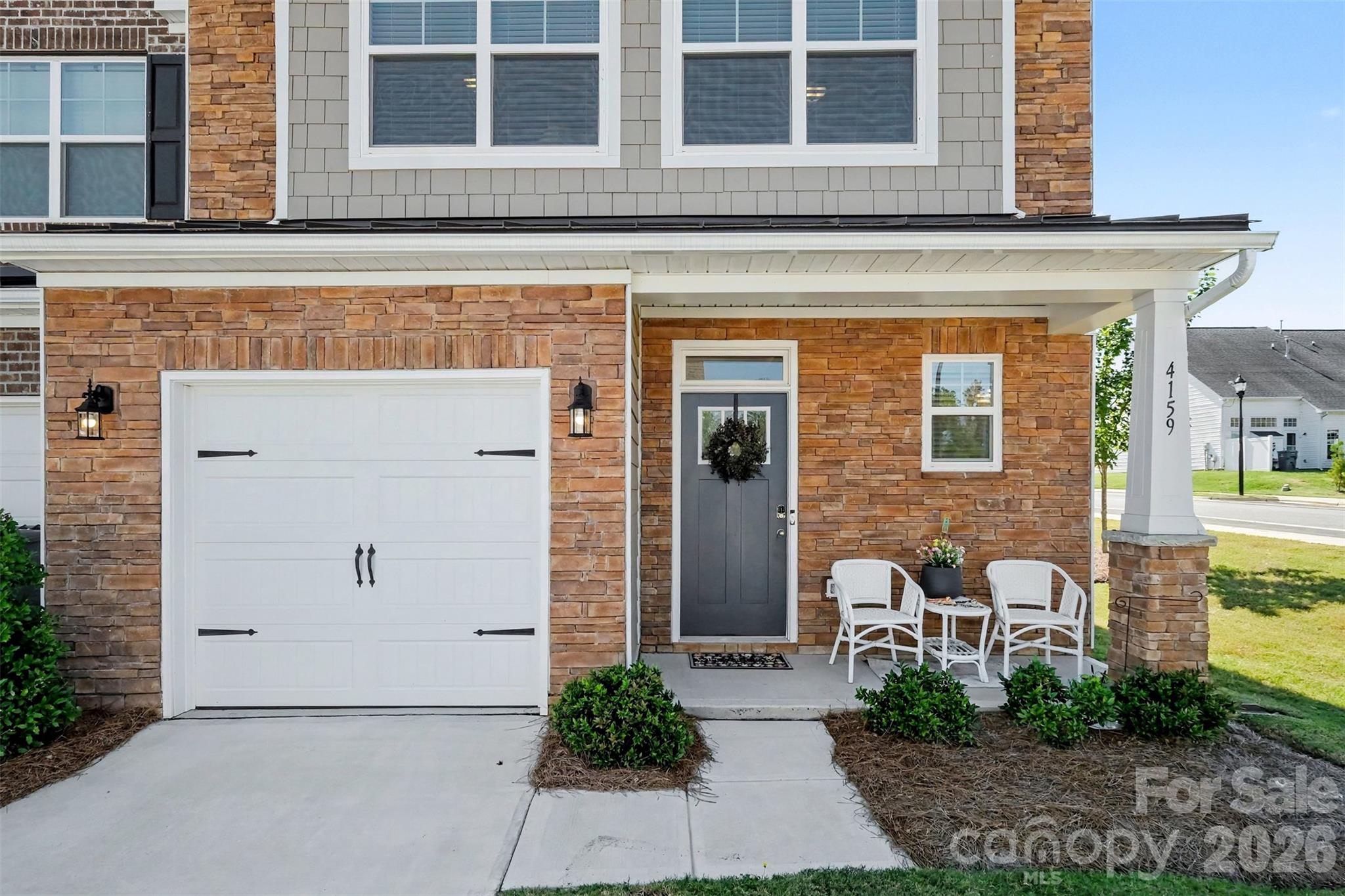 Watch the world go by on your front porch. - 4159 Black Court, Harrisburg