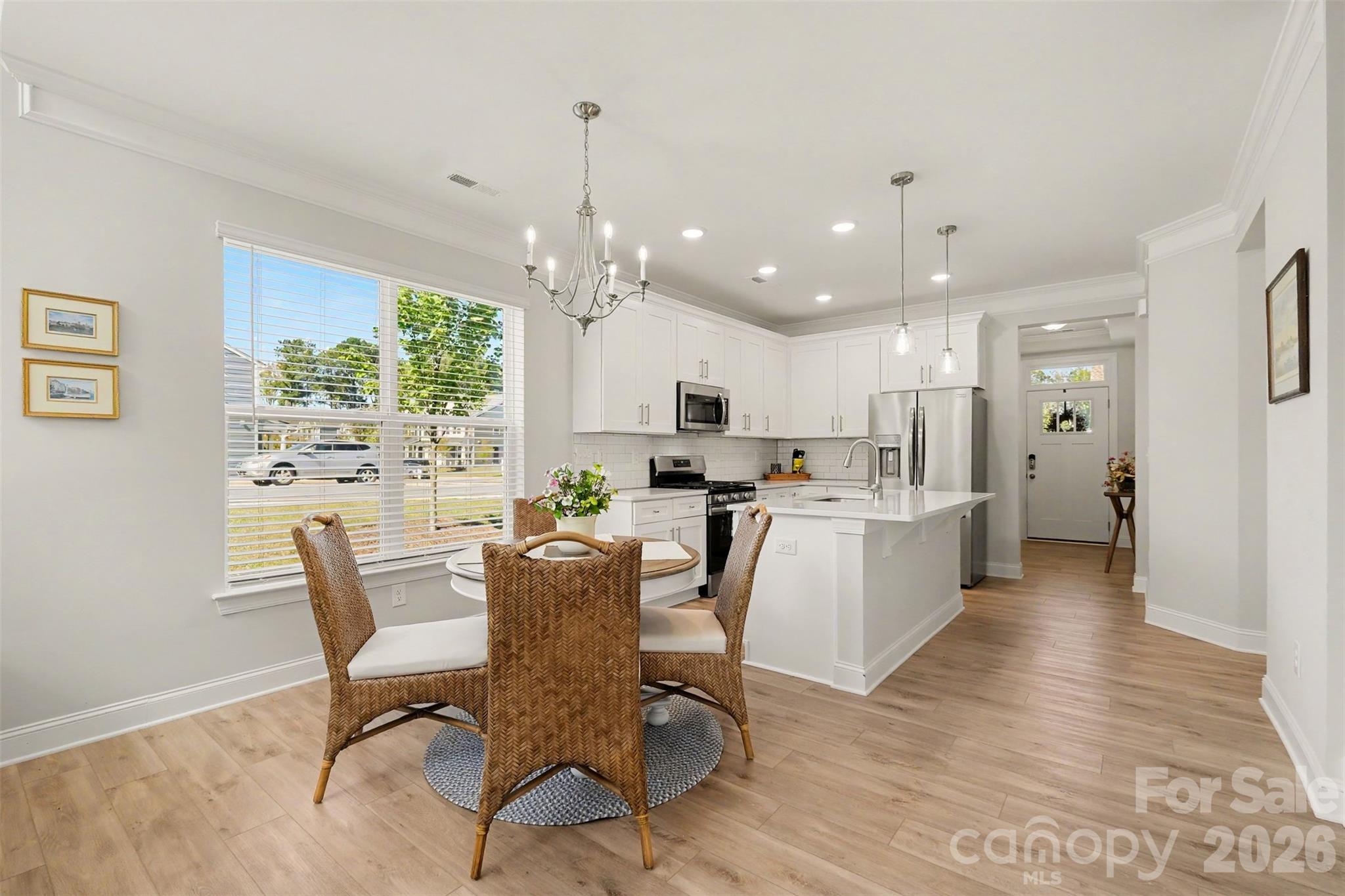 Enter through the foyer and move into your beautiful, white kitchen with quartz countertops and stainless steel appliances. - 4159 Black Court, Harrisburg