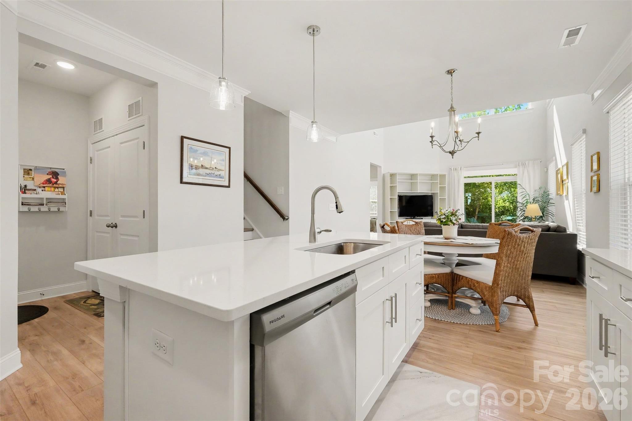 The kitchen flows to the dining area and then continues into the two story great room. - 4159 Black Court, Harrisburg
