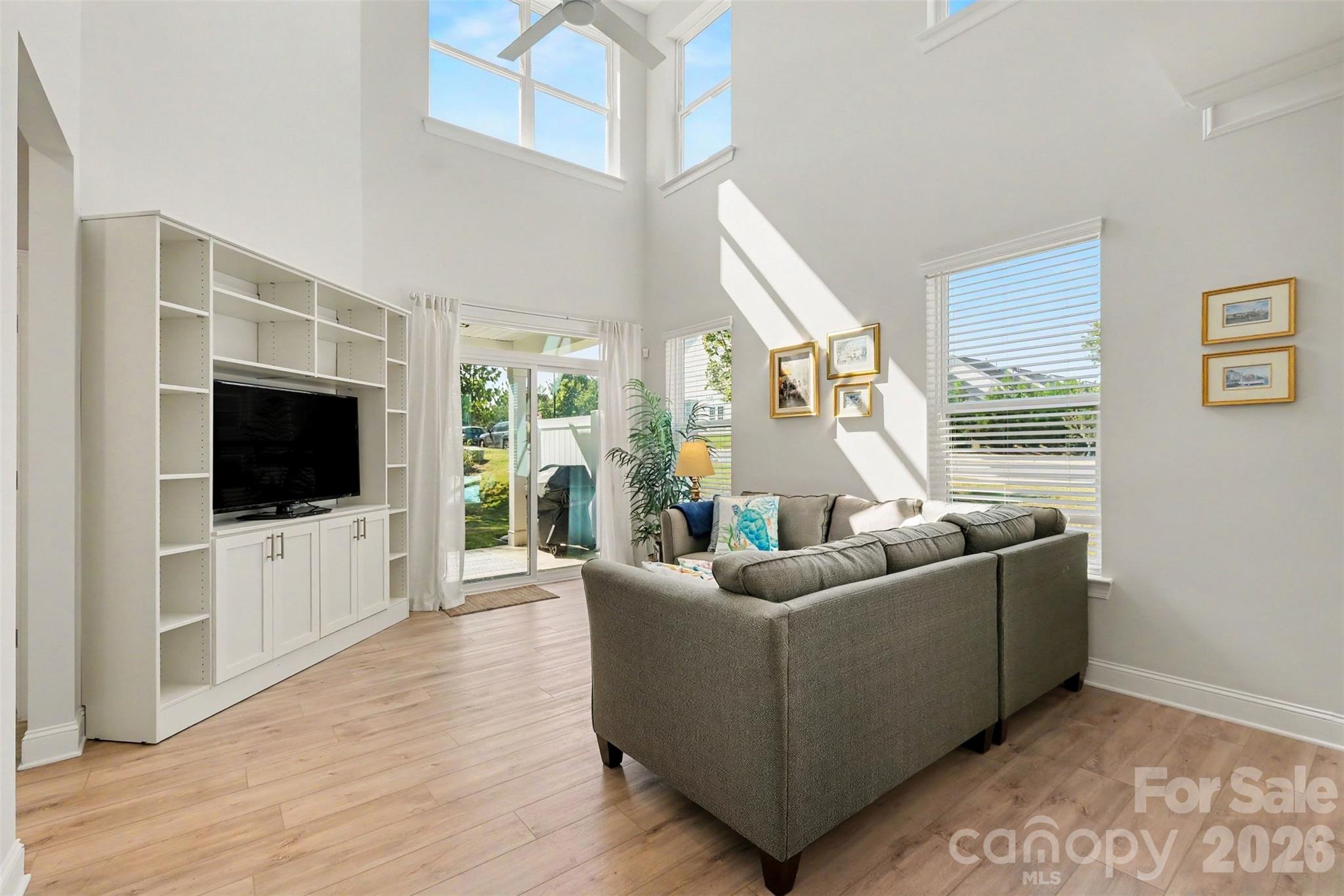 Custom built wall unit with lots of shelving. - 4159 Black Court, Harrisburg