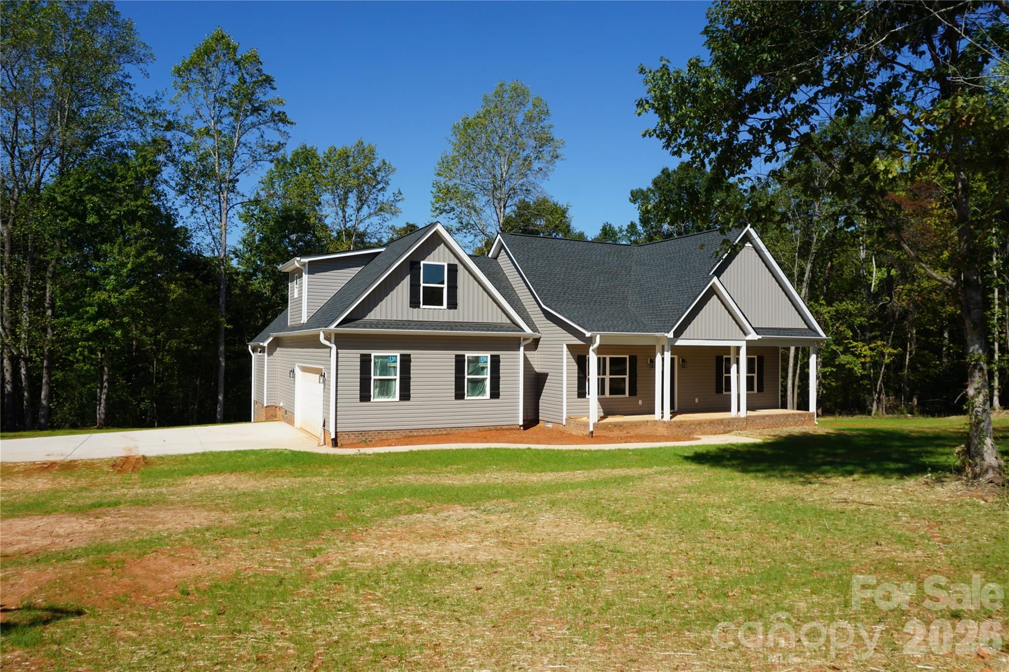 Home sits off the road on a 1.4 +/- acre lot. - 989 Rhyne Road, Clover
