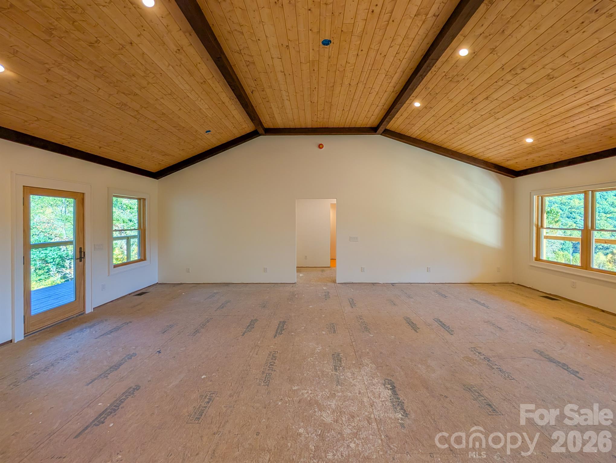 Great room with gorgeous custom designed tongue & groove ceiling & recessed lighting. Designed for kitchen and living area. - 338 Majestic Mountain Drive, Burnsville
